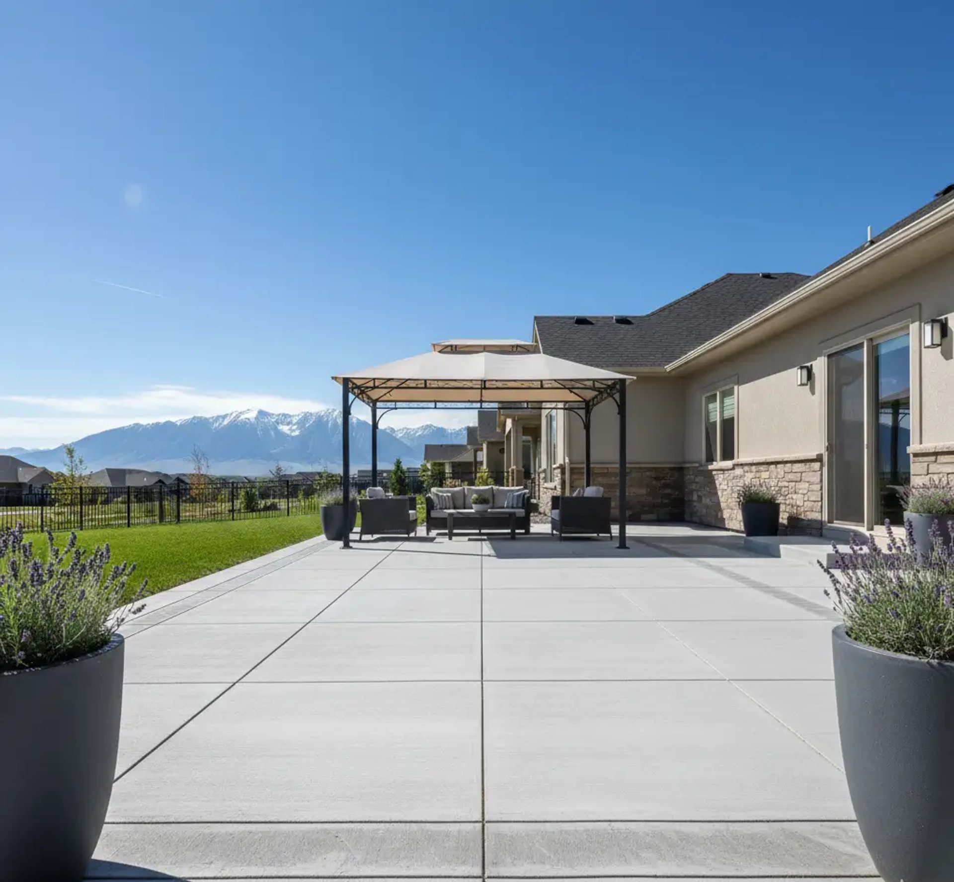 Finished concrete patio resurfacing at a home in Eagle Mountain, Utah with a smooth, durable surface