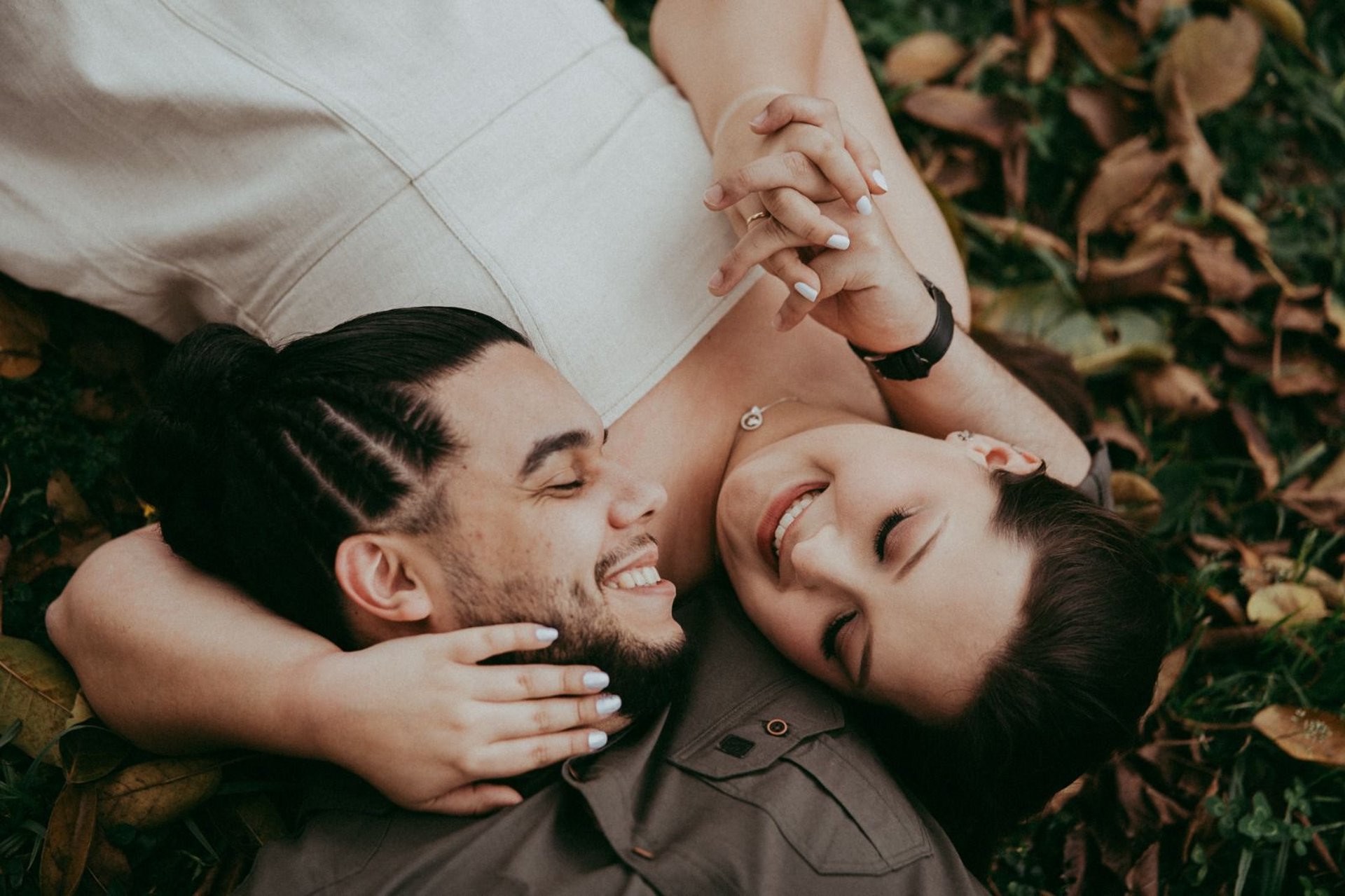 couple wearing silver-colored rings