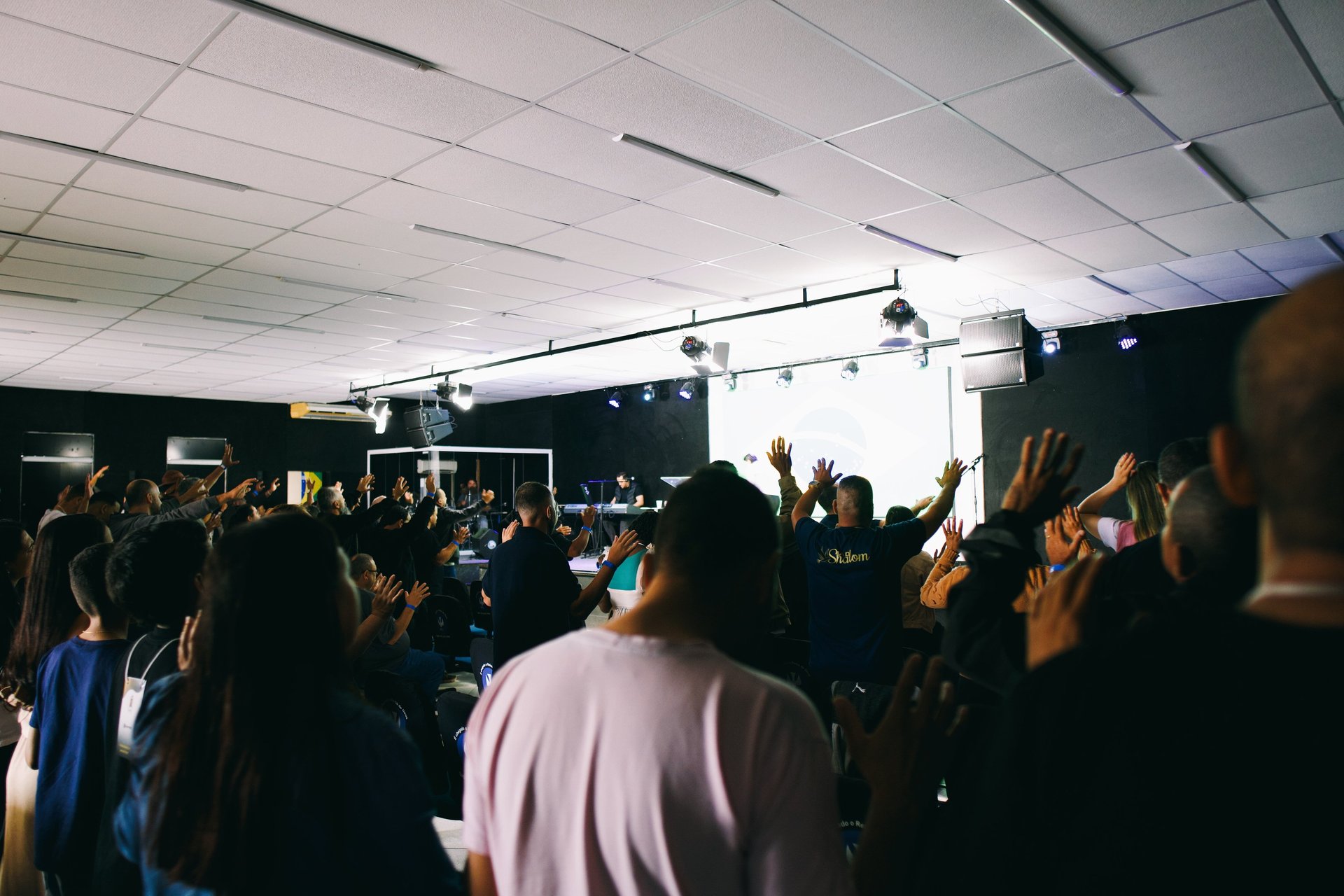 woman wearing yellow long-sleeved dress under white clouds and blue sky during daytime