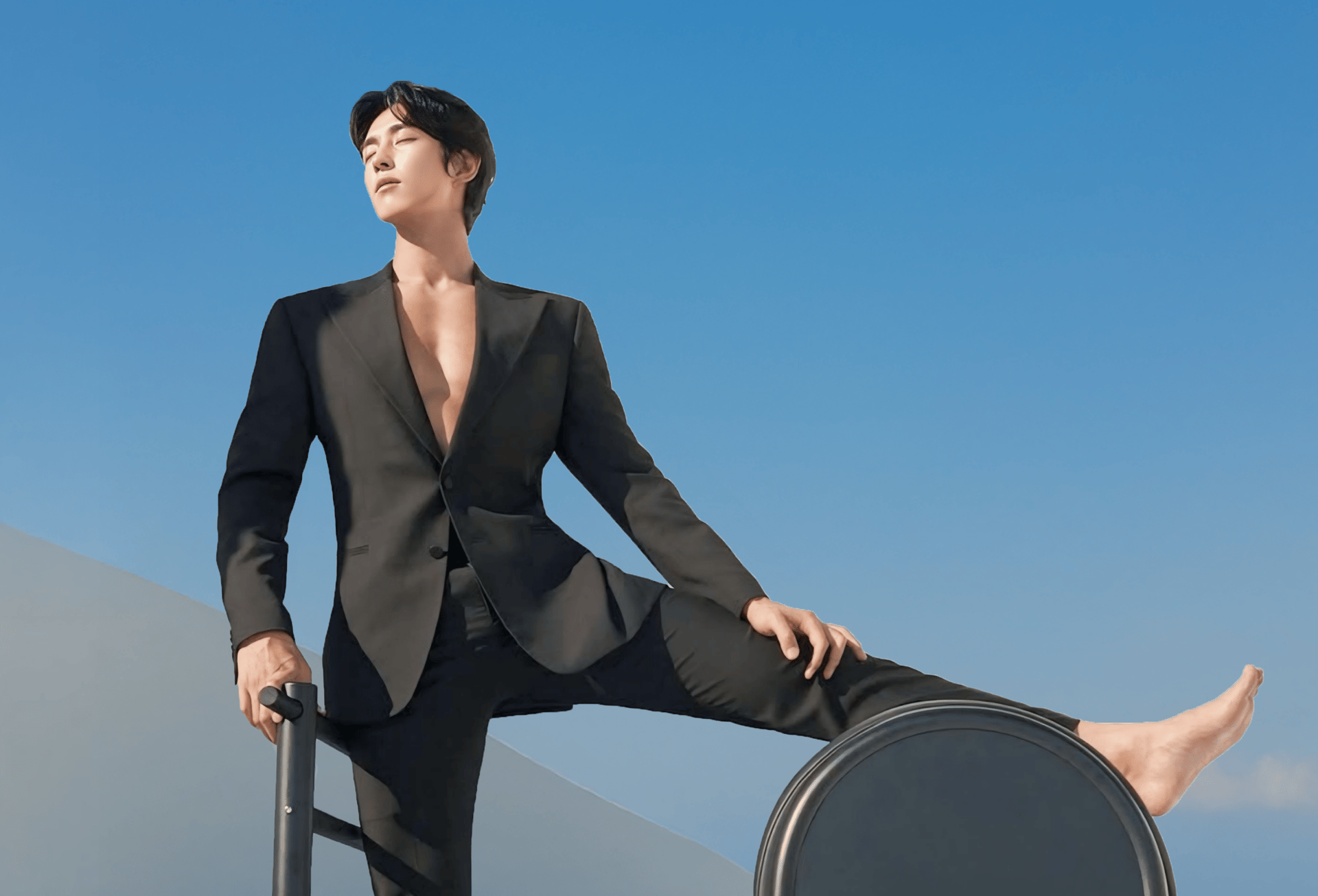 a woman is doing exercises on a rowing machine