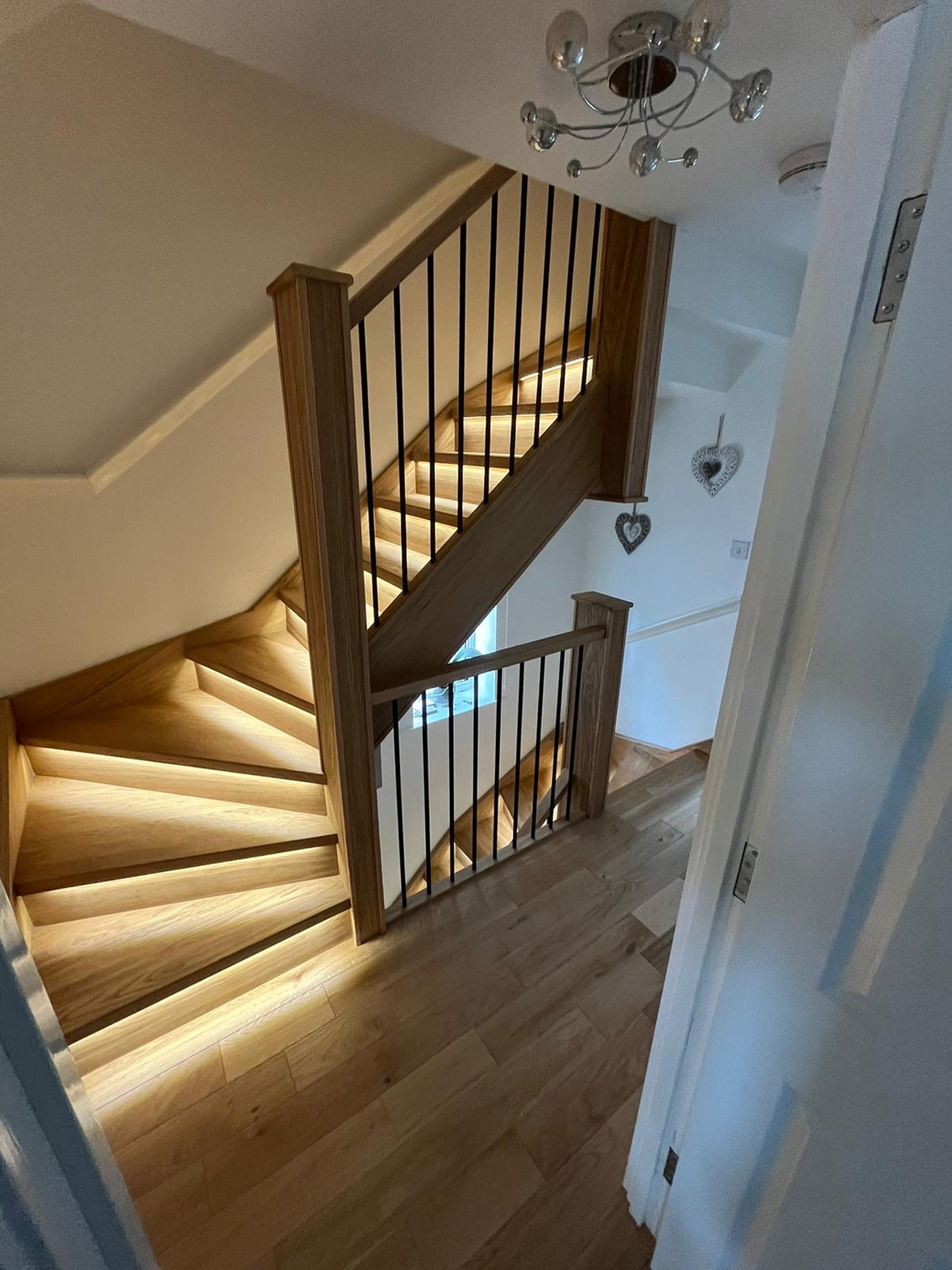 black and brown leather padded tub sofa