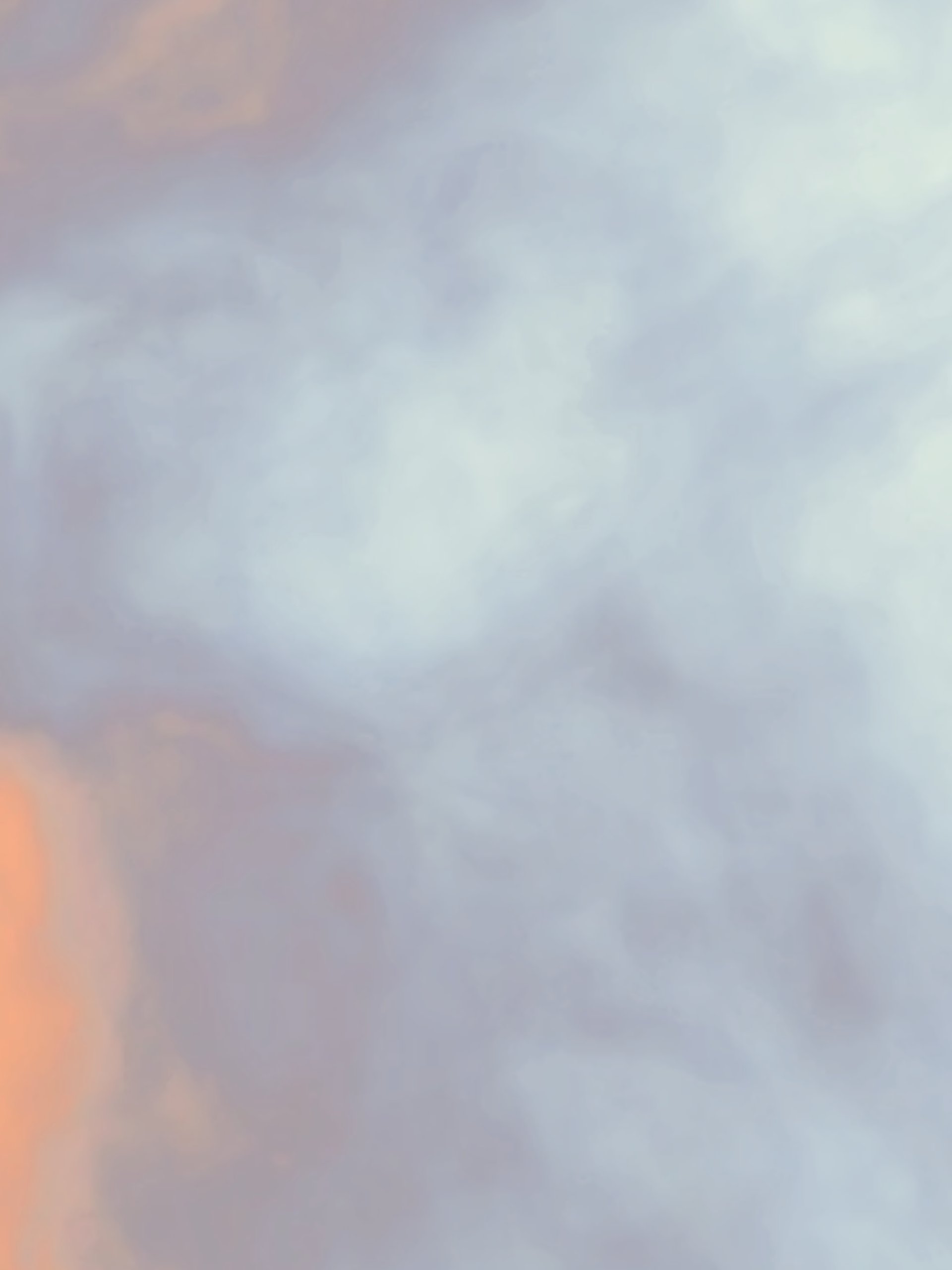 Abstract blurred warm-toned background with soft light