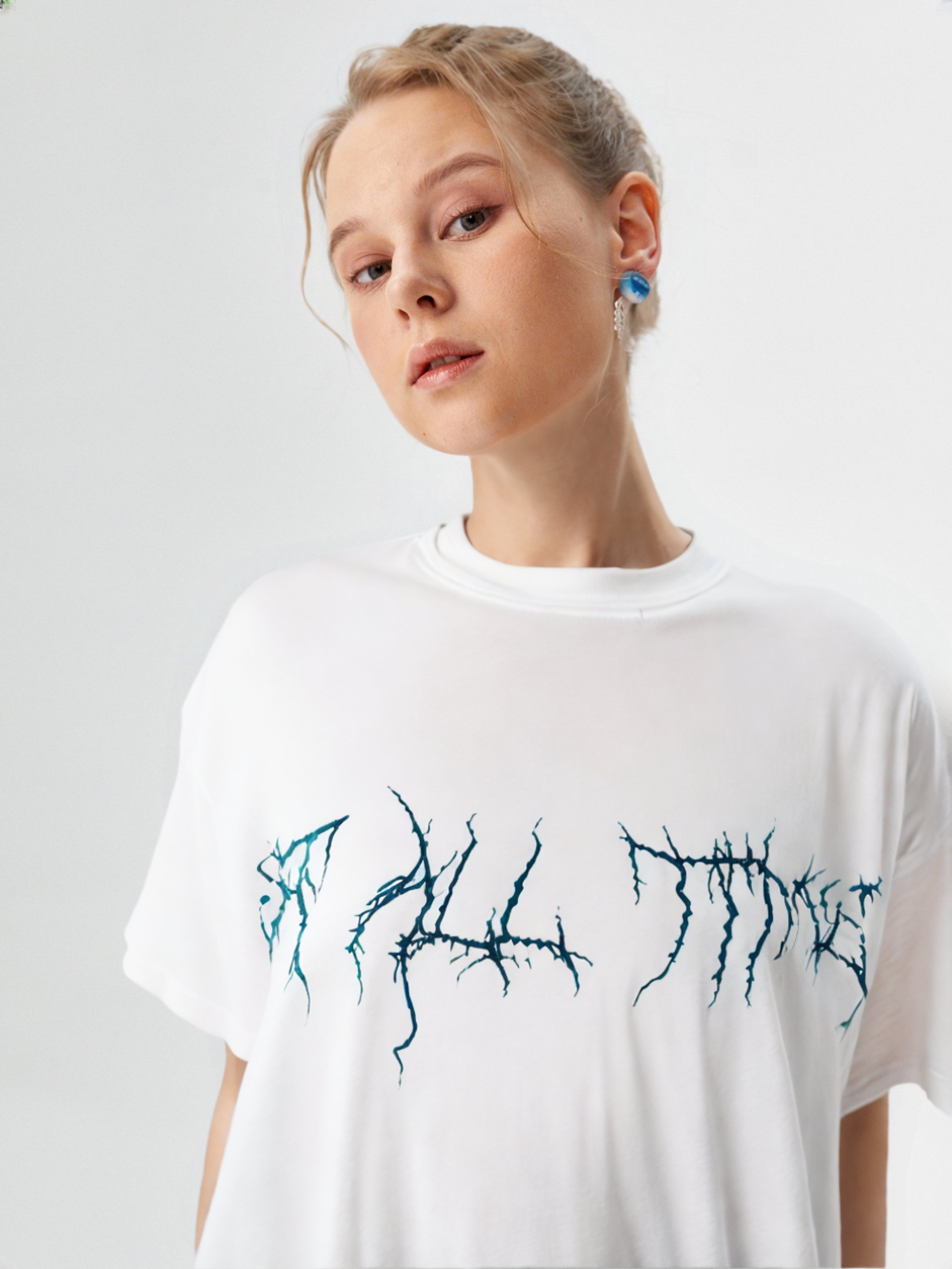 person wearing grey knit sweater