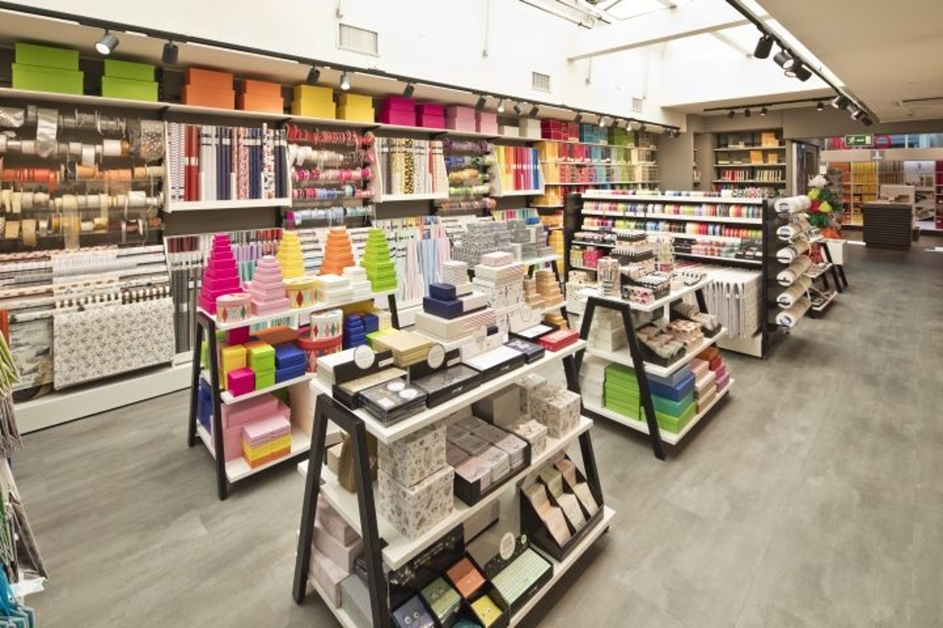 Souvenirs and craft items are displayed at a market.