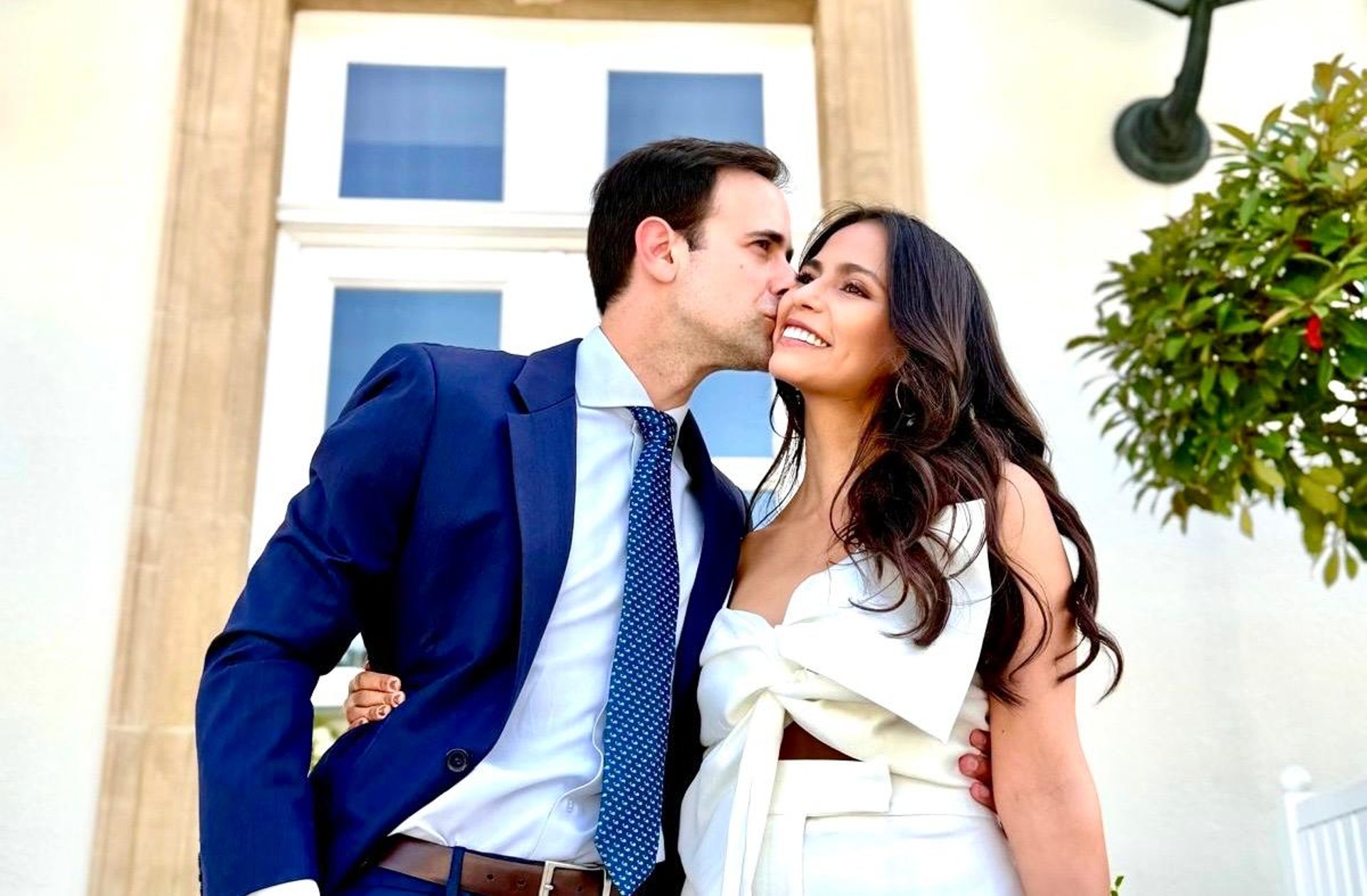 couple wearing silver-colored rings