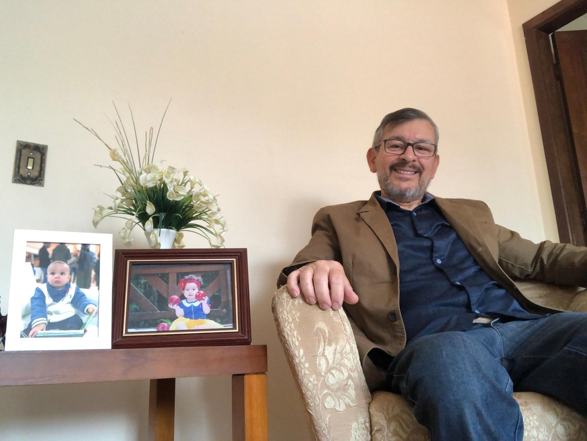 woman wearing yellow long-sleeved dress under white clouds and blue sky during daytime