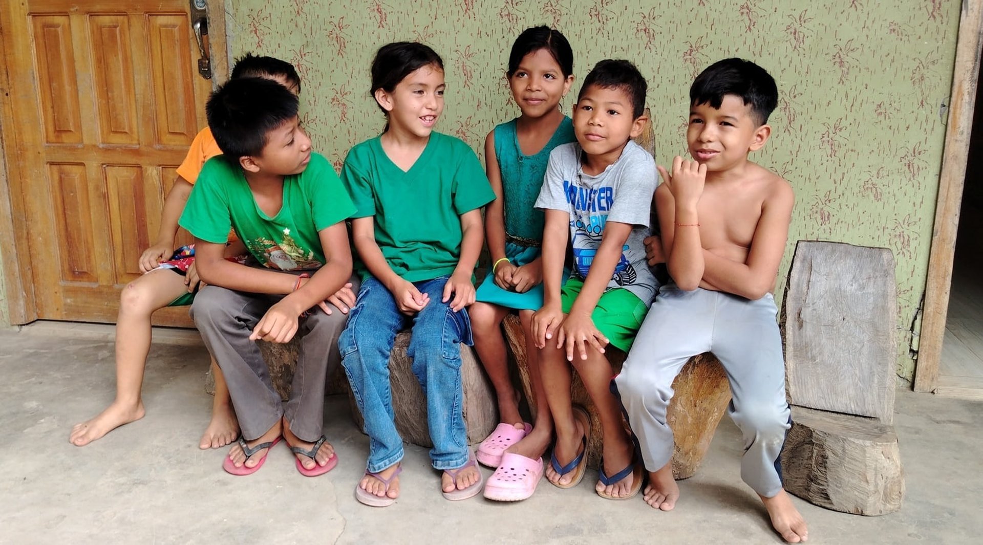 woman wearing yellow long-sleeved dress under white clouds and blue sky during daytime