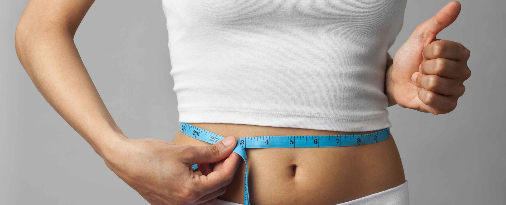 white round medication pill on yellow surface