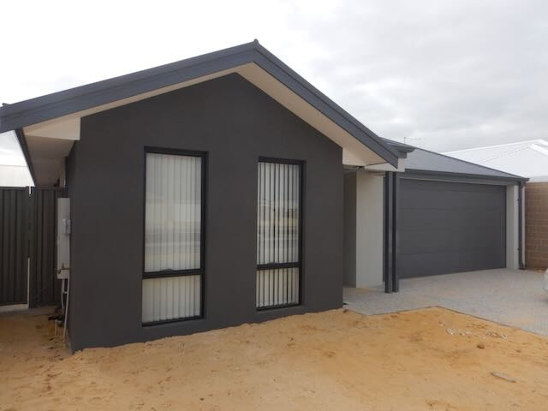 Perth Building inspector surveying brick property for a dilapidation report. 