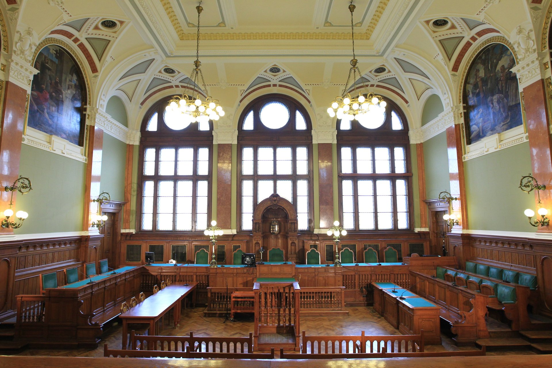 black and brown leather padded tub sofa
