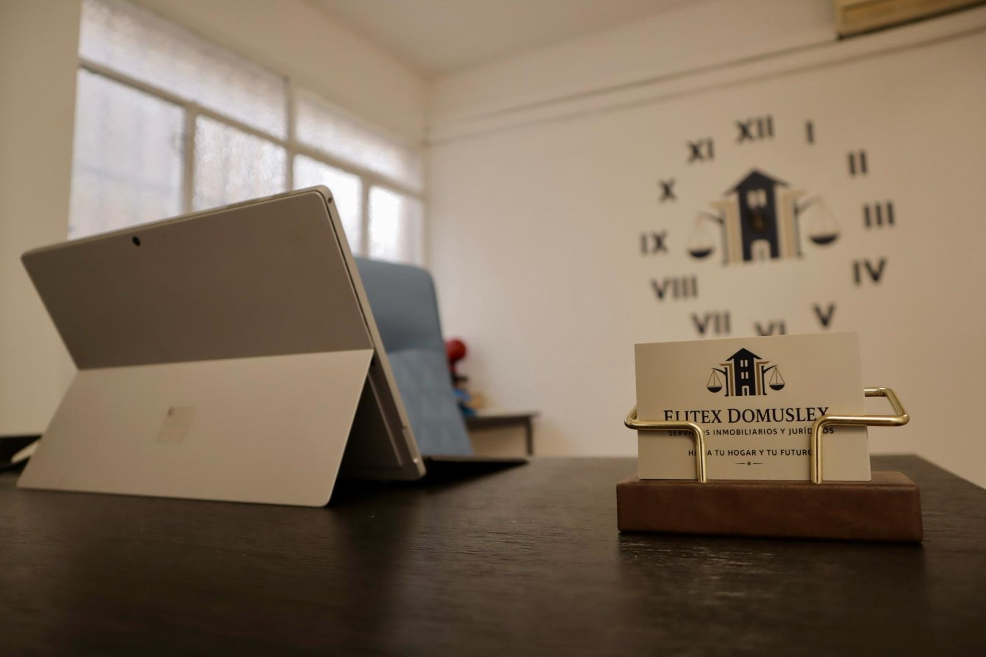 black and brown leather padded tub sofa
