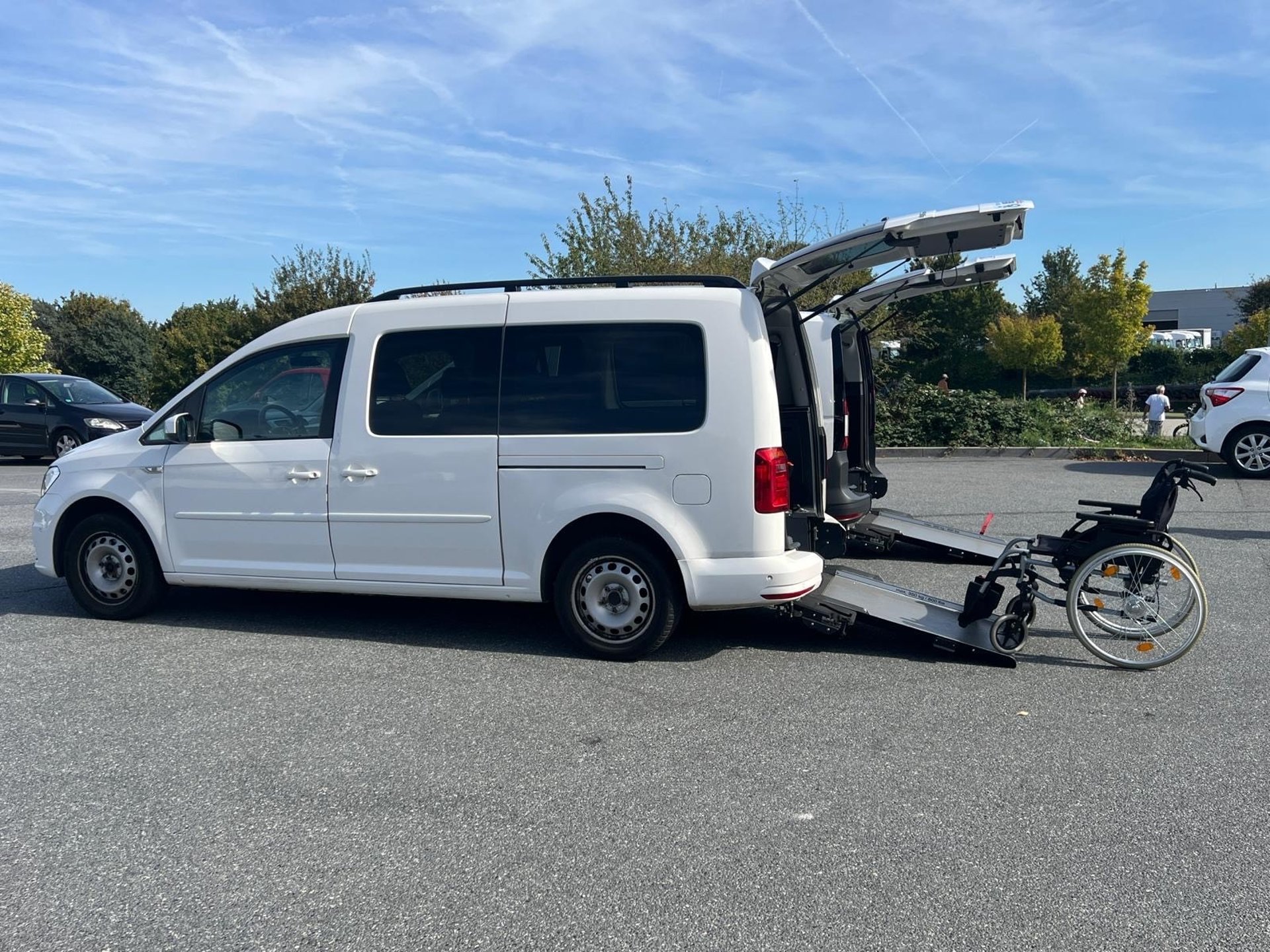 black and brown leather padded tub sofa