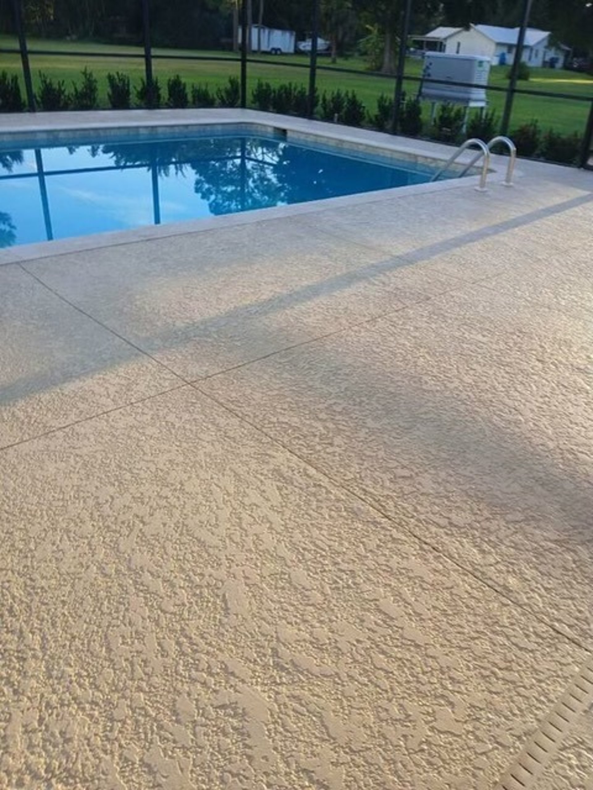 a man standing next to a building under construction