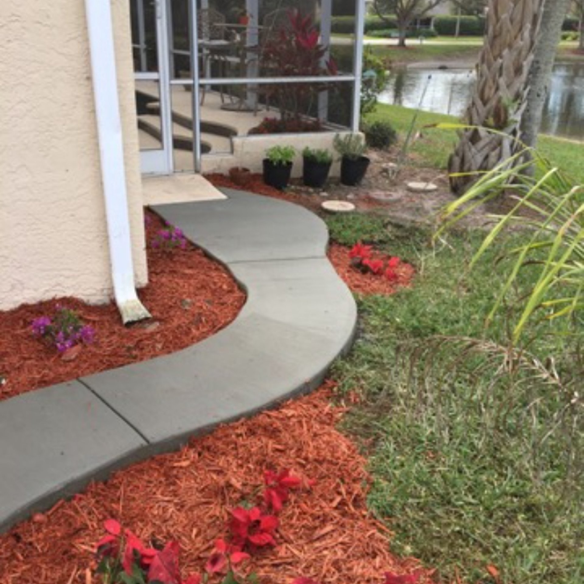 a man standing next to a building under construction