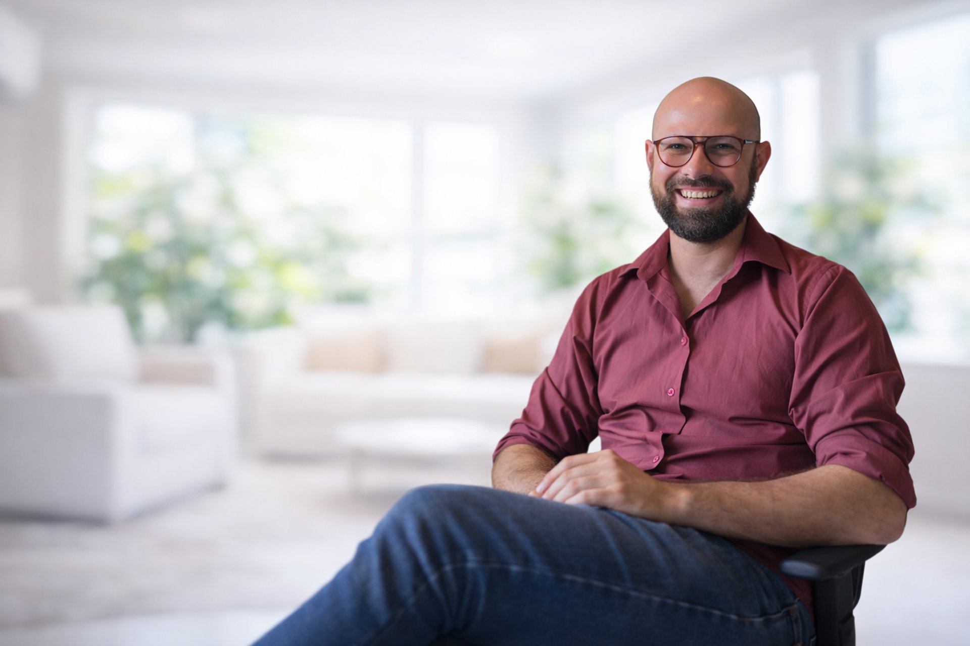 an abstract photo of a curved building with a blue sky in the background