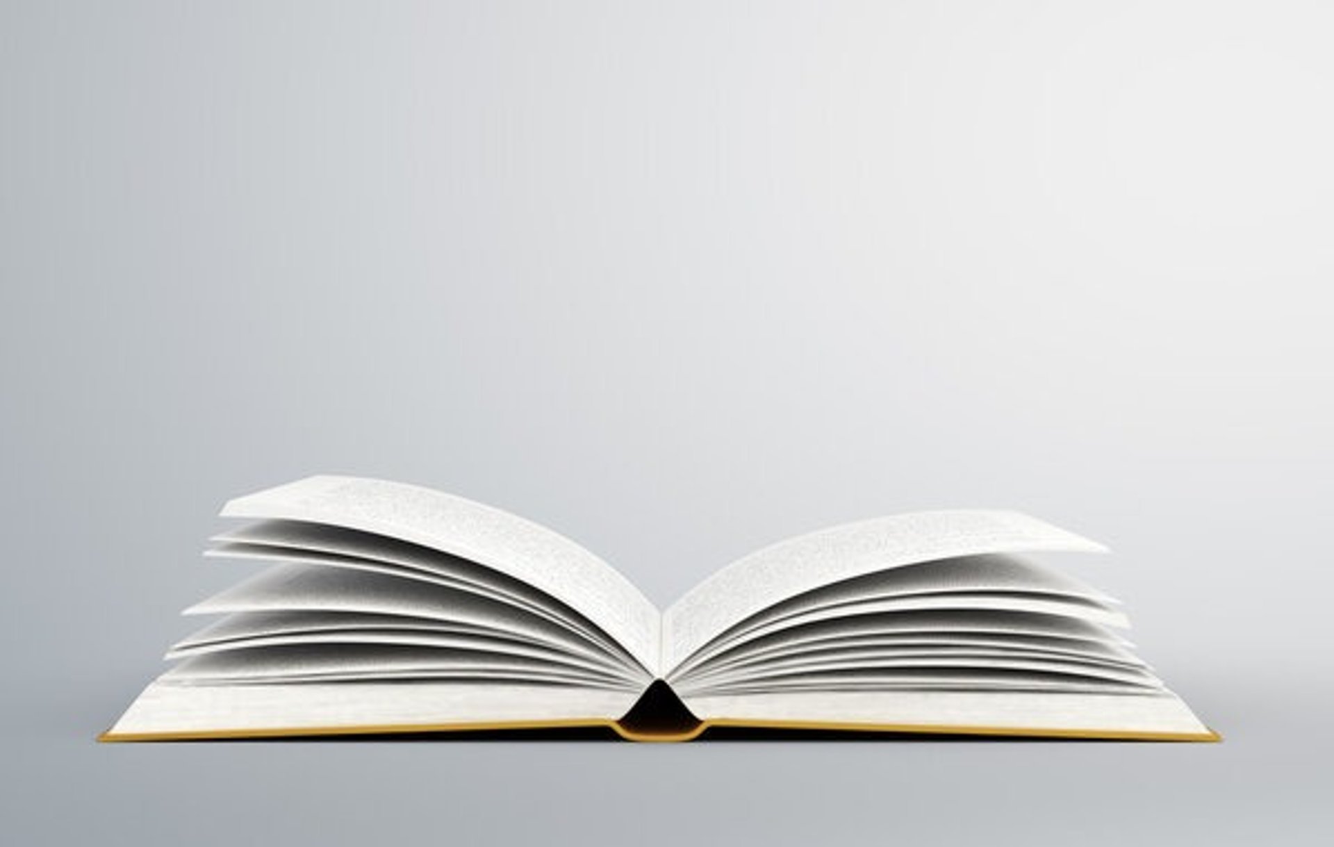 A stack of thick folders on a white surface