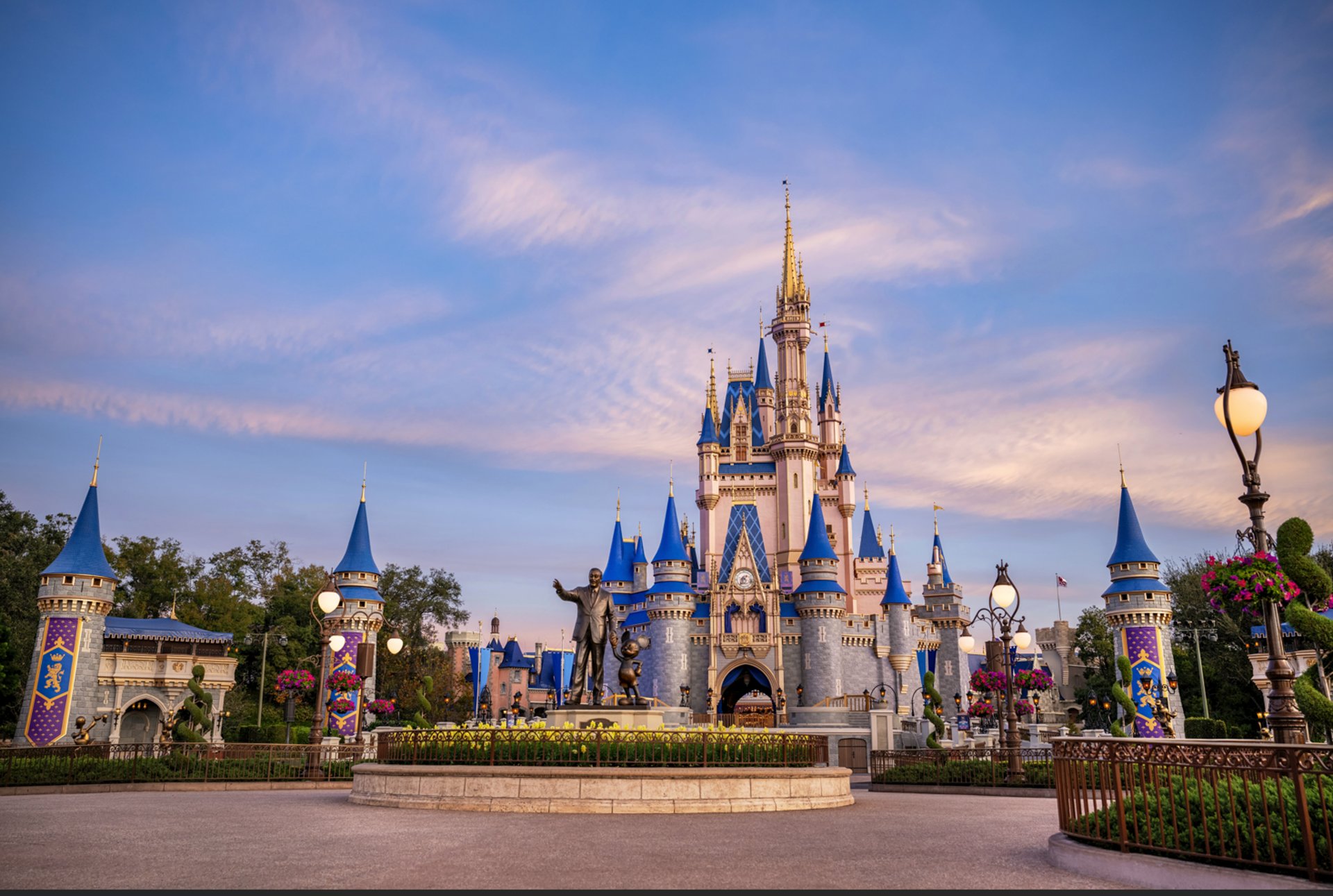 landscape photography of Walt Disney castle under cloudy sky