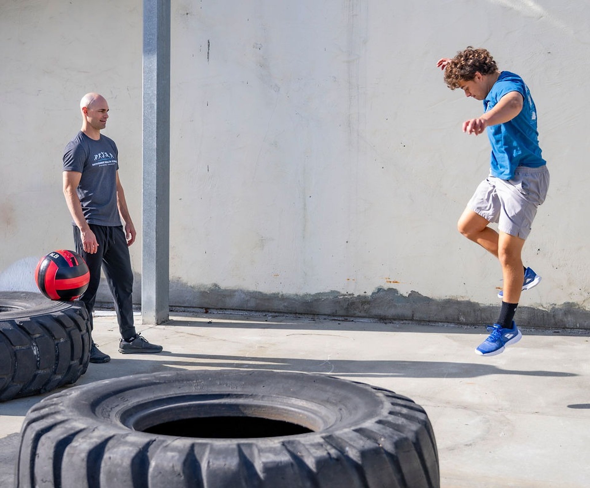 black and brown leather padded tub sofa