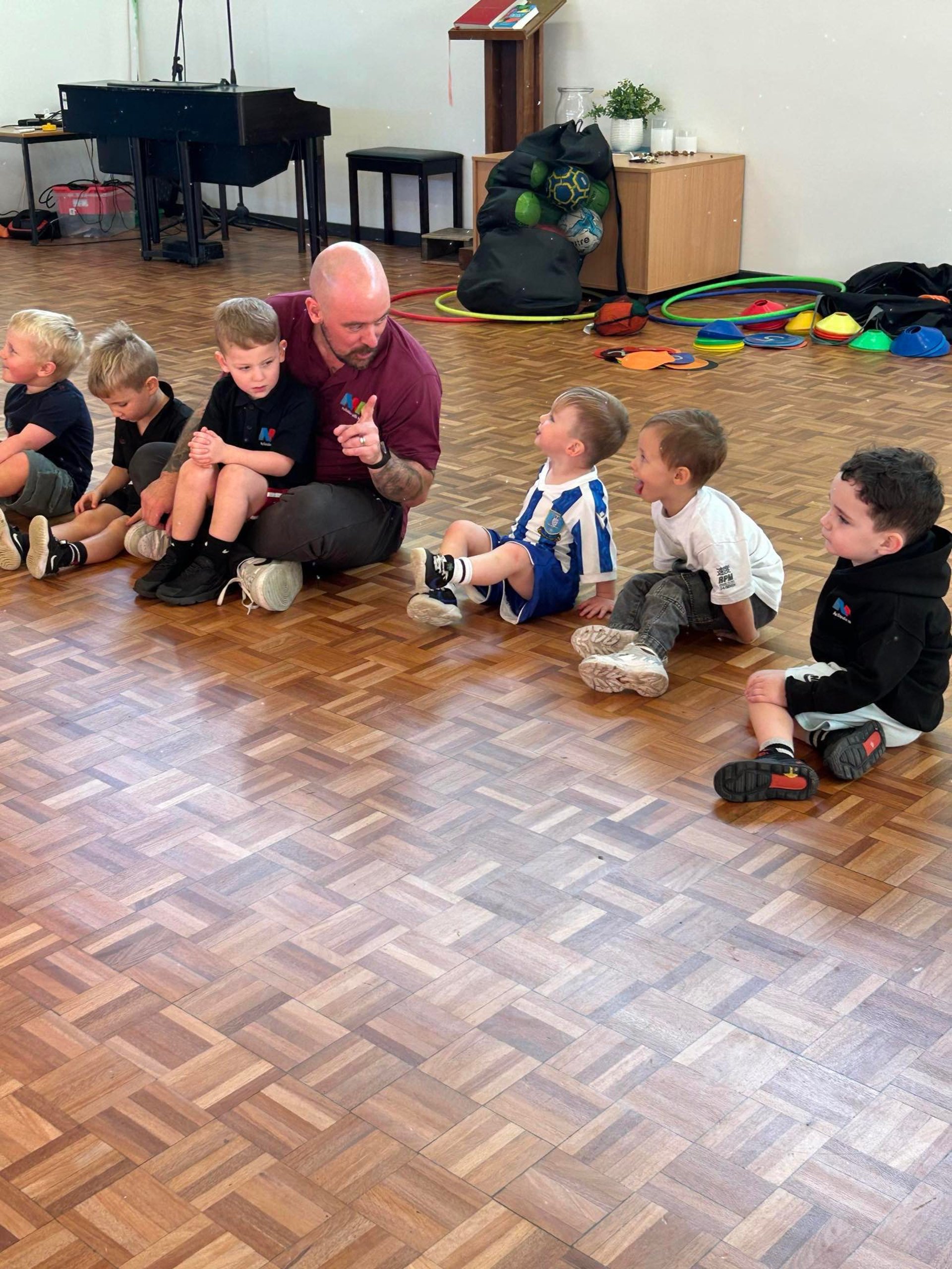 black and brown leather padded tub sofa