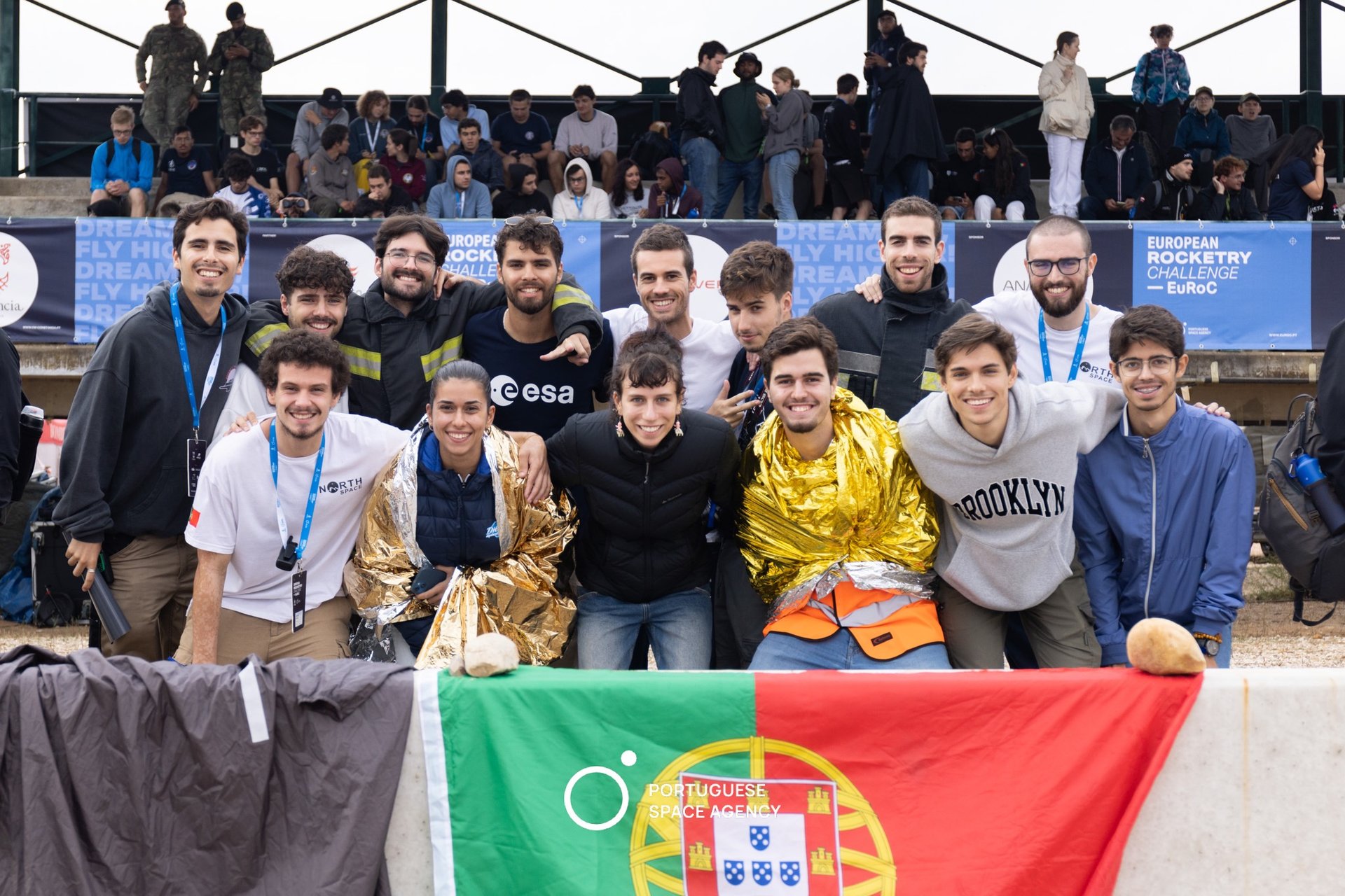 an abstract photo of a curved building with a blue sky in the background