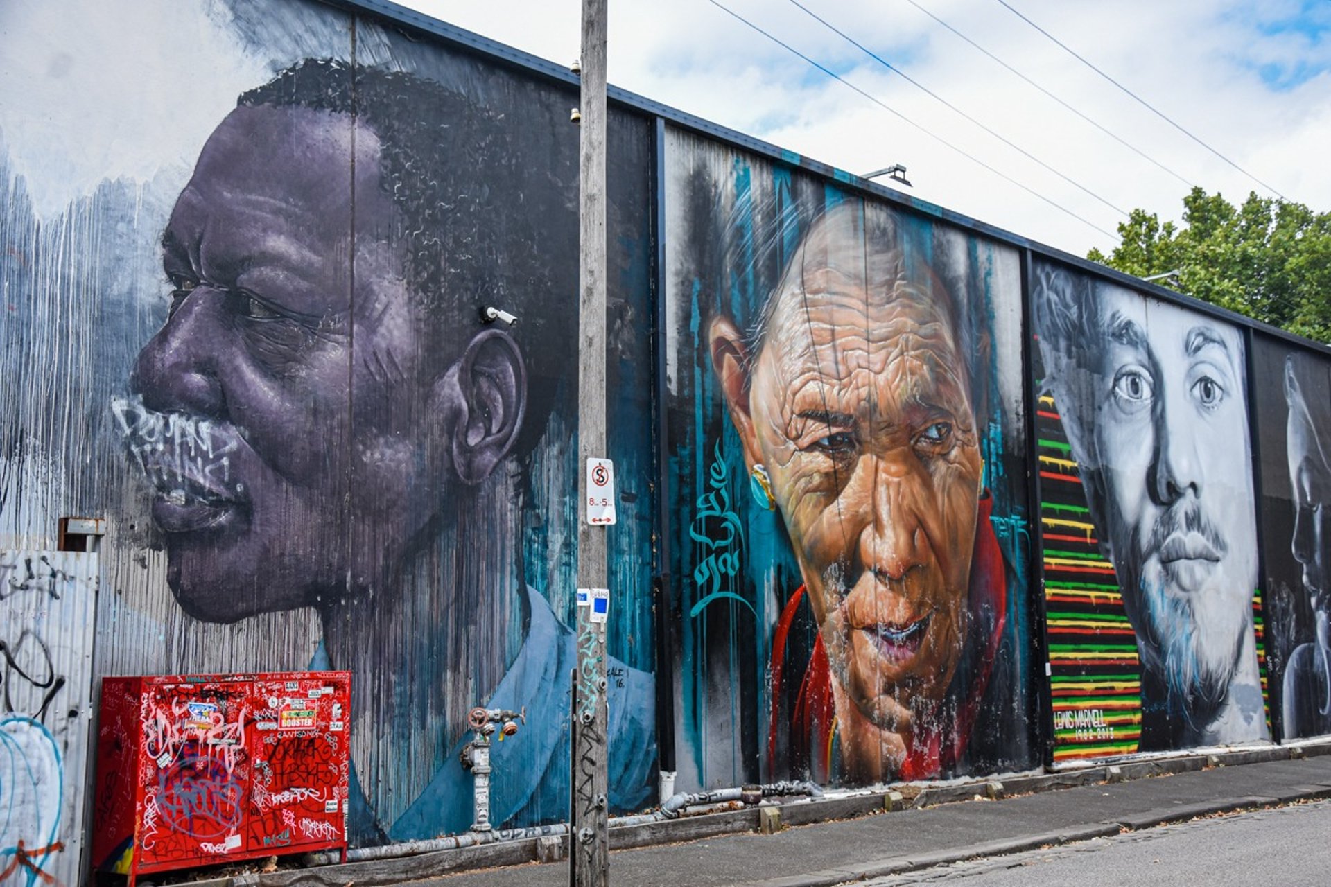 Murals by Cam Scale, Adnate and Dvate in Fitzroy, Melbourne