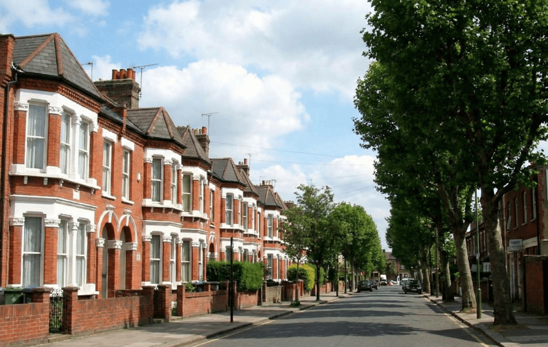a body of water with boats and buildings along it