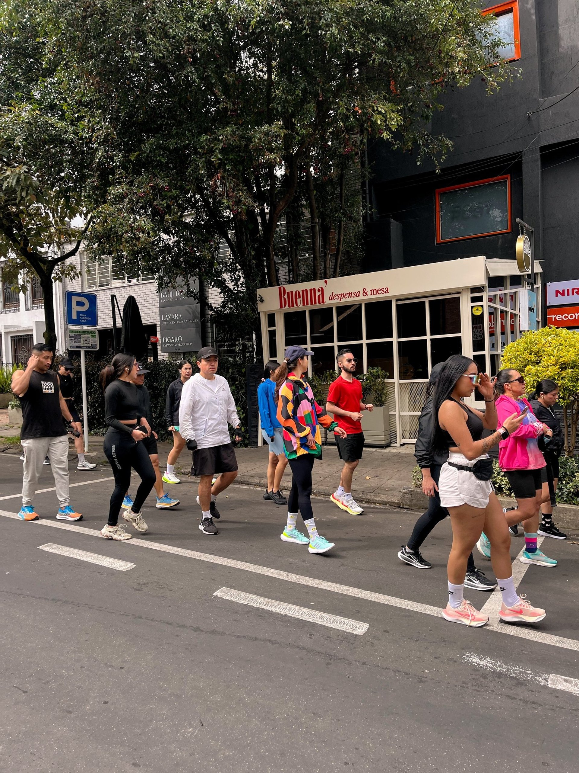 an abstract photo of a curved building with a blue sky in the background