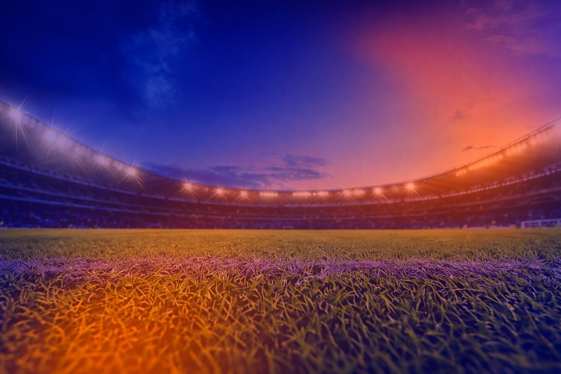 an abstract photo of a curved building with a blue sky in the background