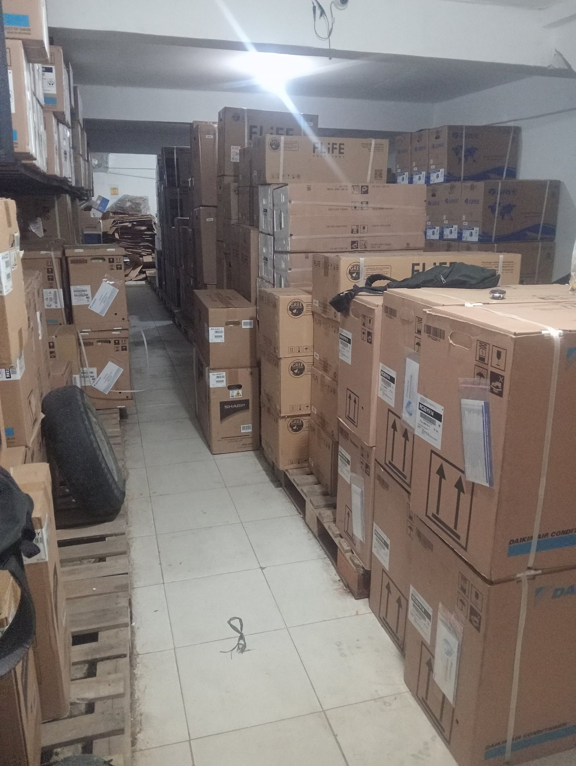 woman wearing yellow long-sleeved dress under white clouds and blue sky during daytime