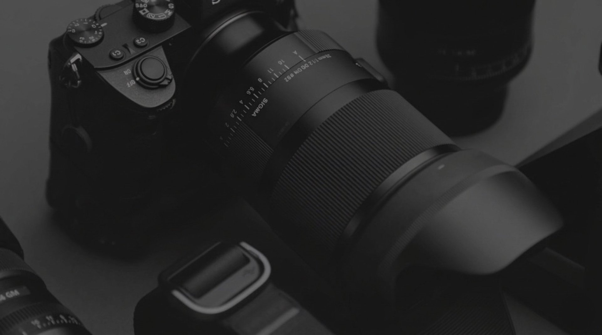 an abstract photo of a curved building with a blue sky in the background