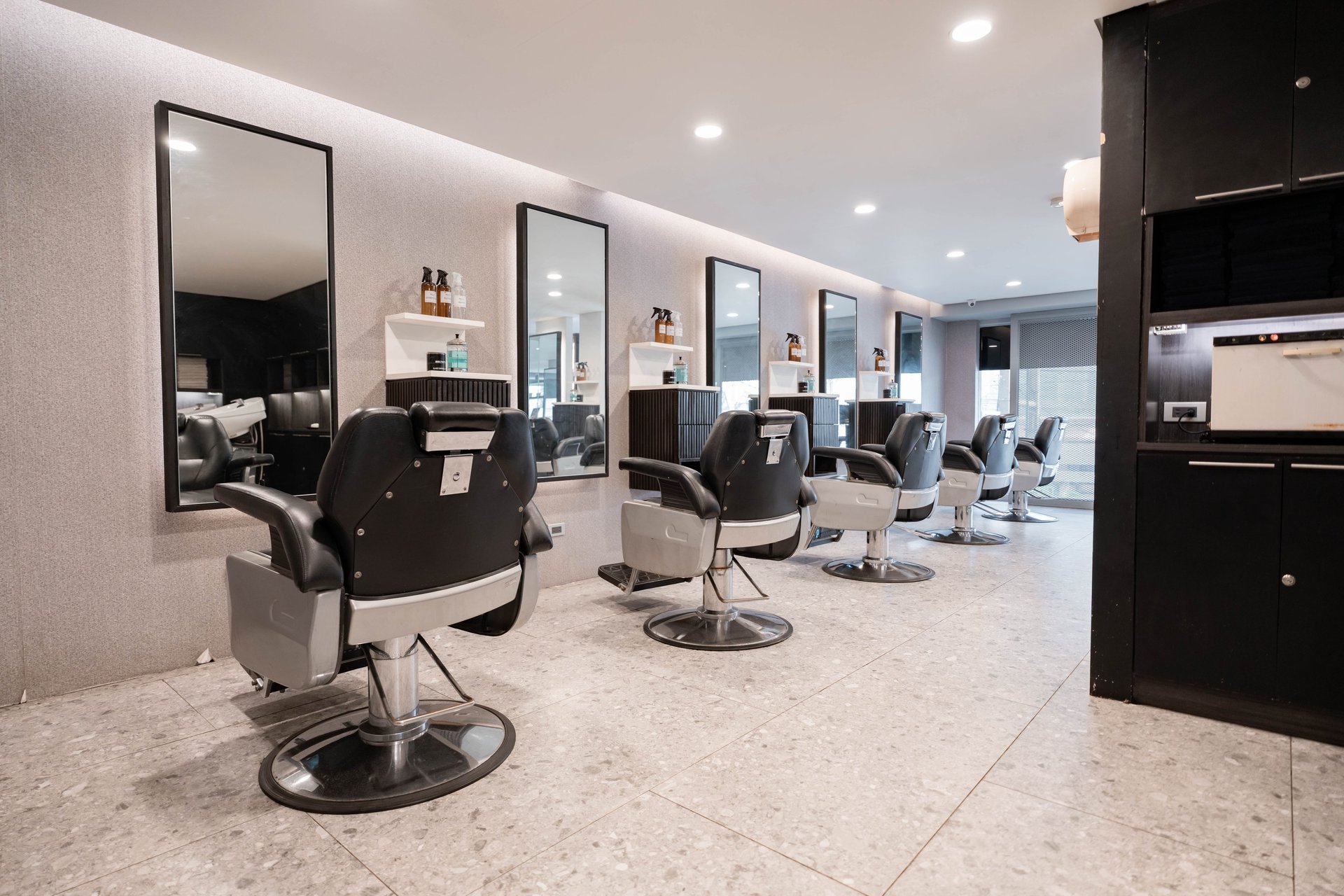 an abstract photo of a curved building with a blue sky in the background