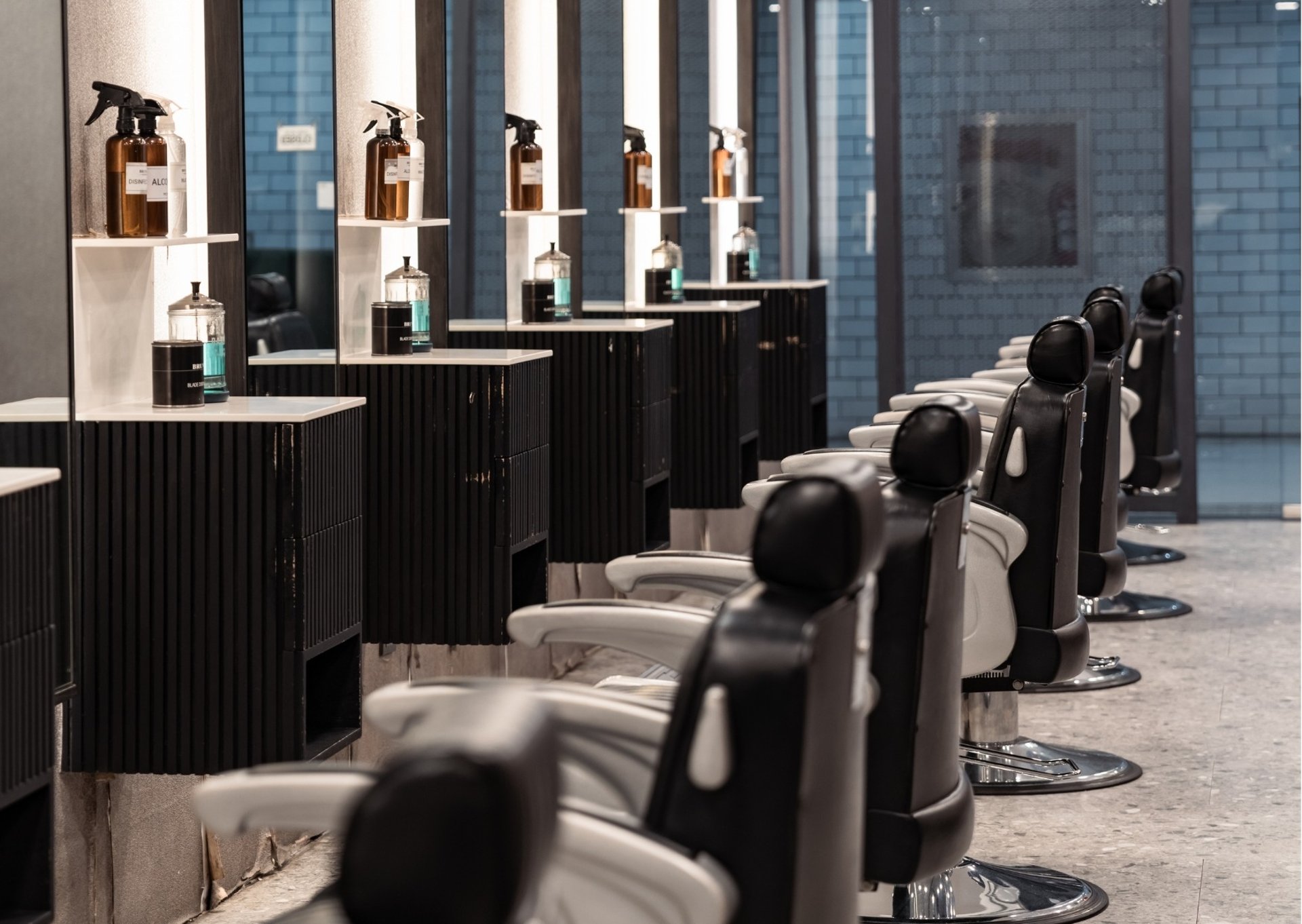 black and brown leather padded tub sofa