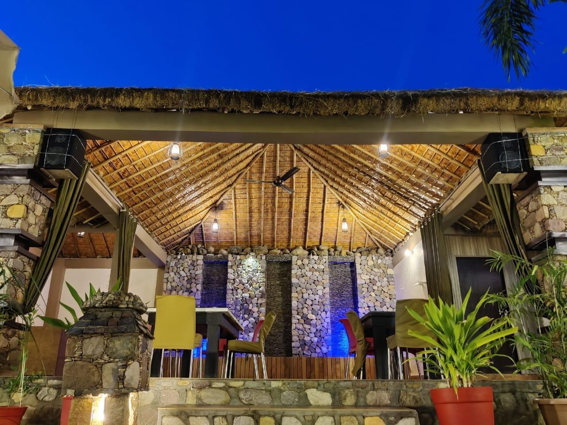 woman wearing yellow long-sleeved dress under white clouds and blue sky during daytime
