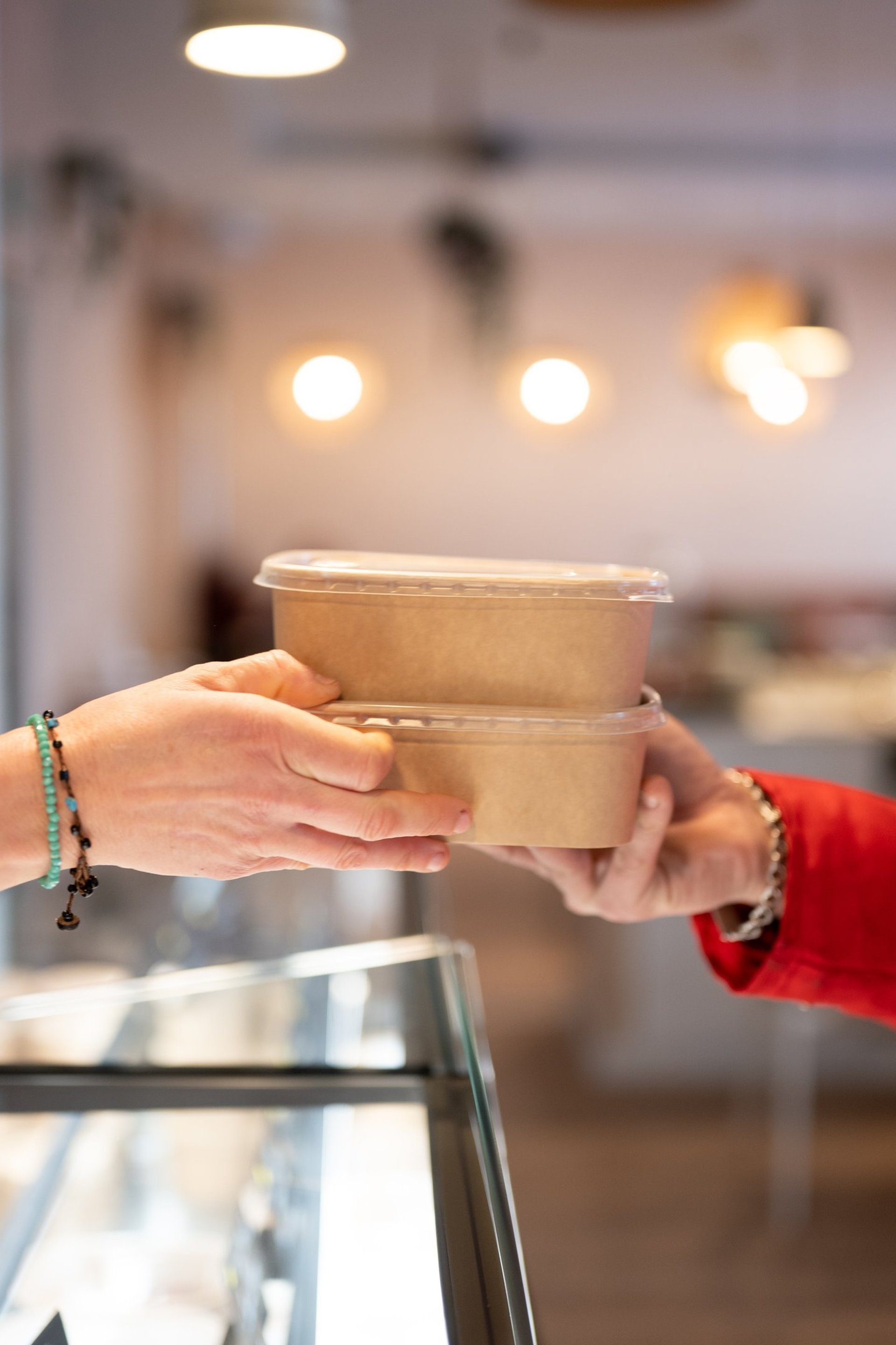 an abstract photo of a curved building with a blue sky in the background