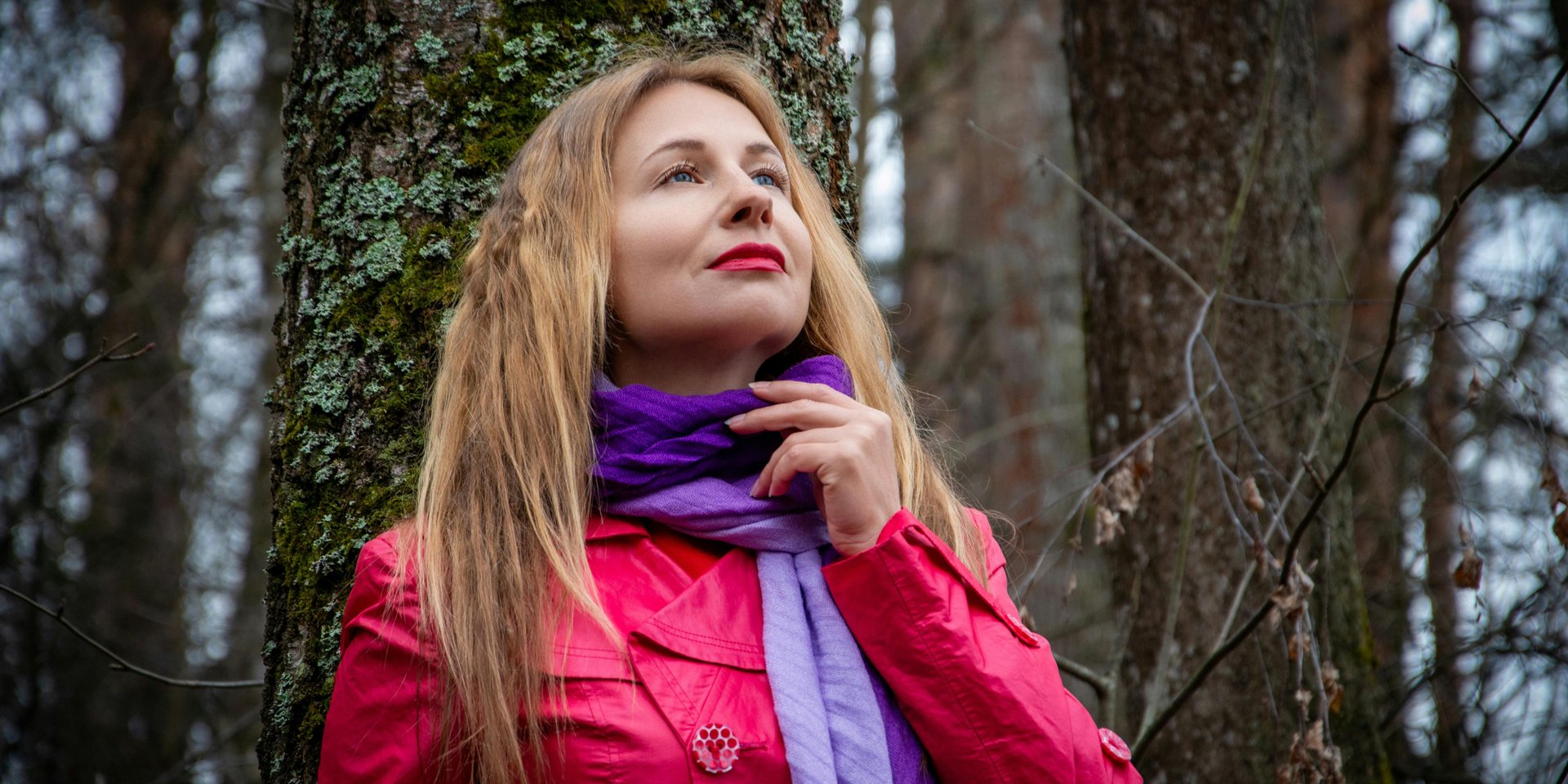 person in white dress shirt holding brown wooden chopsticks