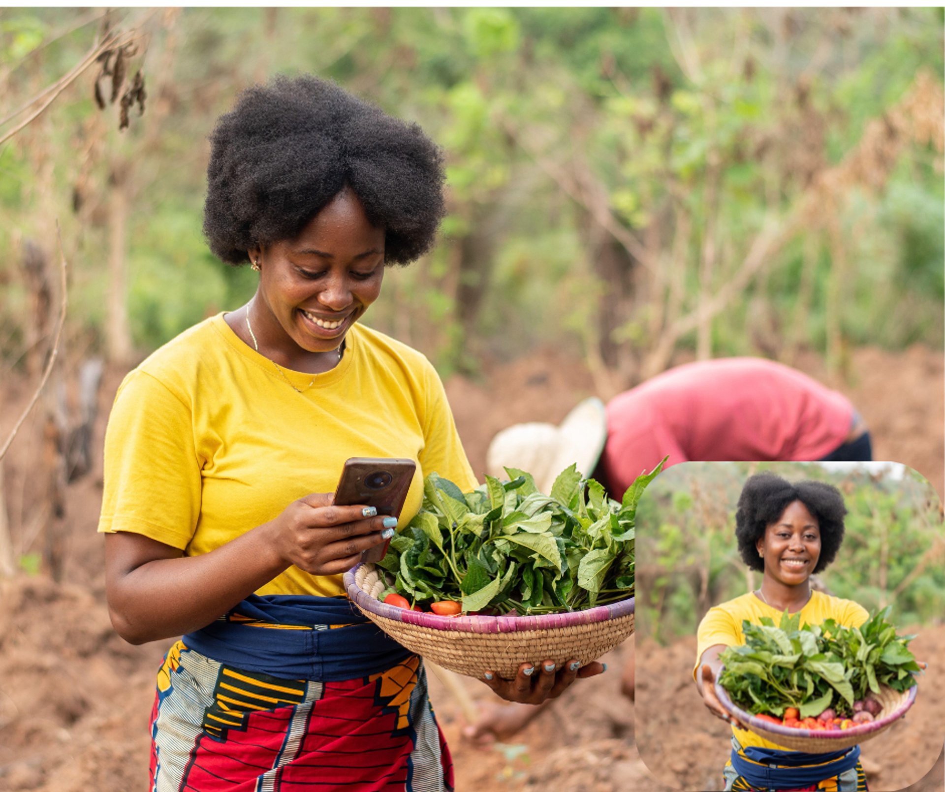 a woman walking down a dirt road in the middle of a field