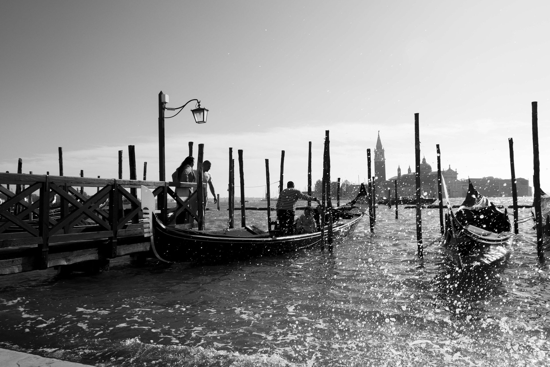 an abstract photo of a curved building with a blue sky in the background