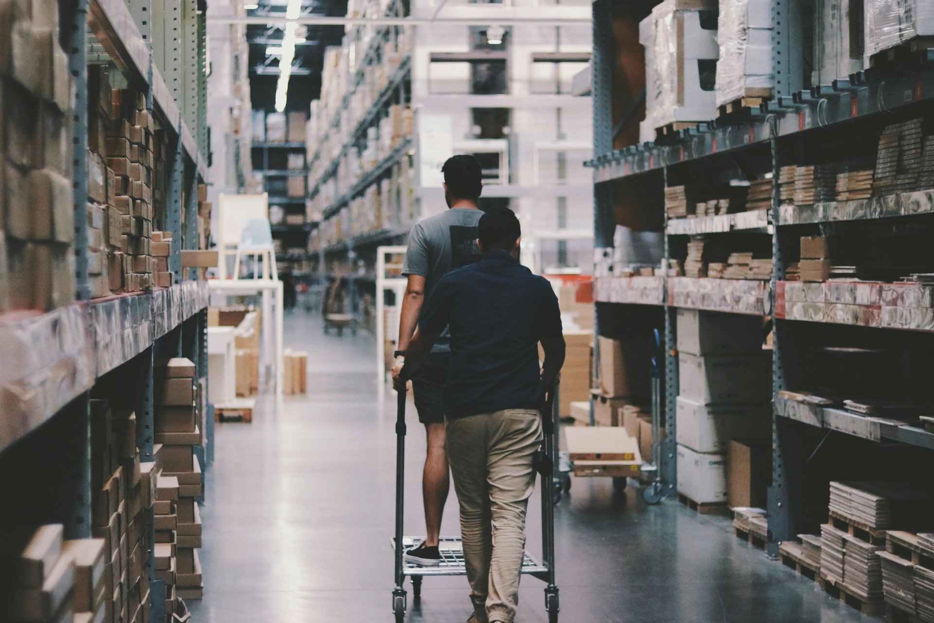 a large warehouse filled with lots of pallets