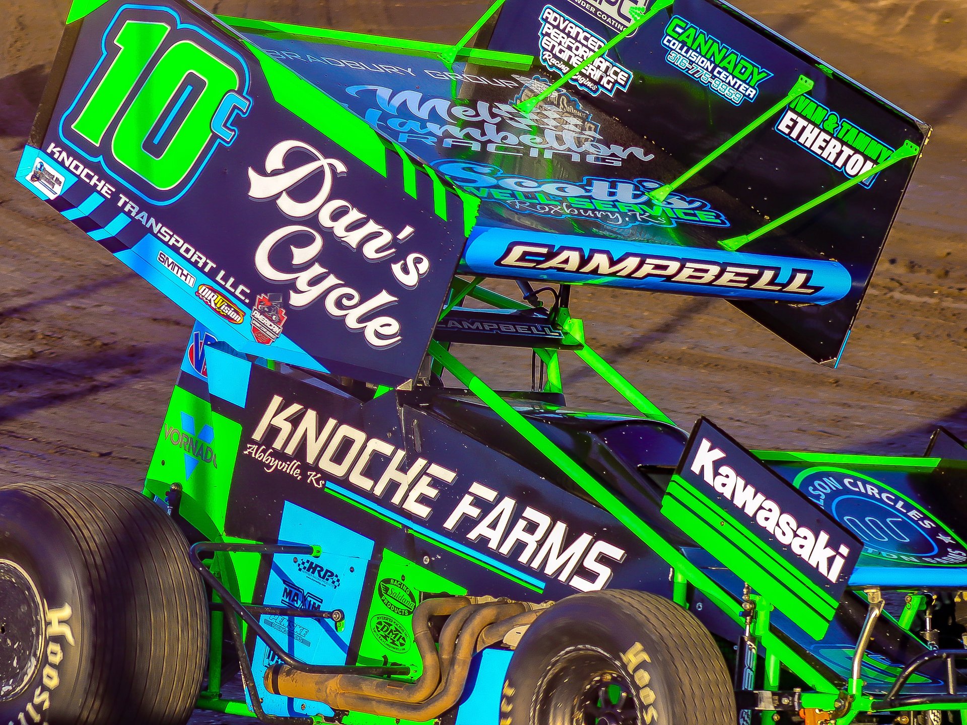 black and brown leather padded tub sofa