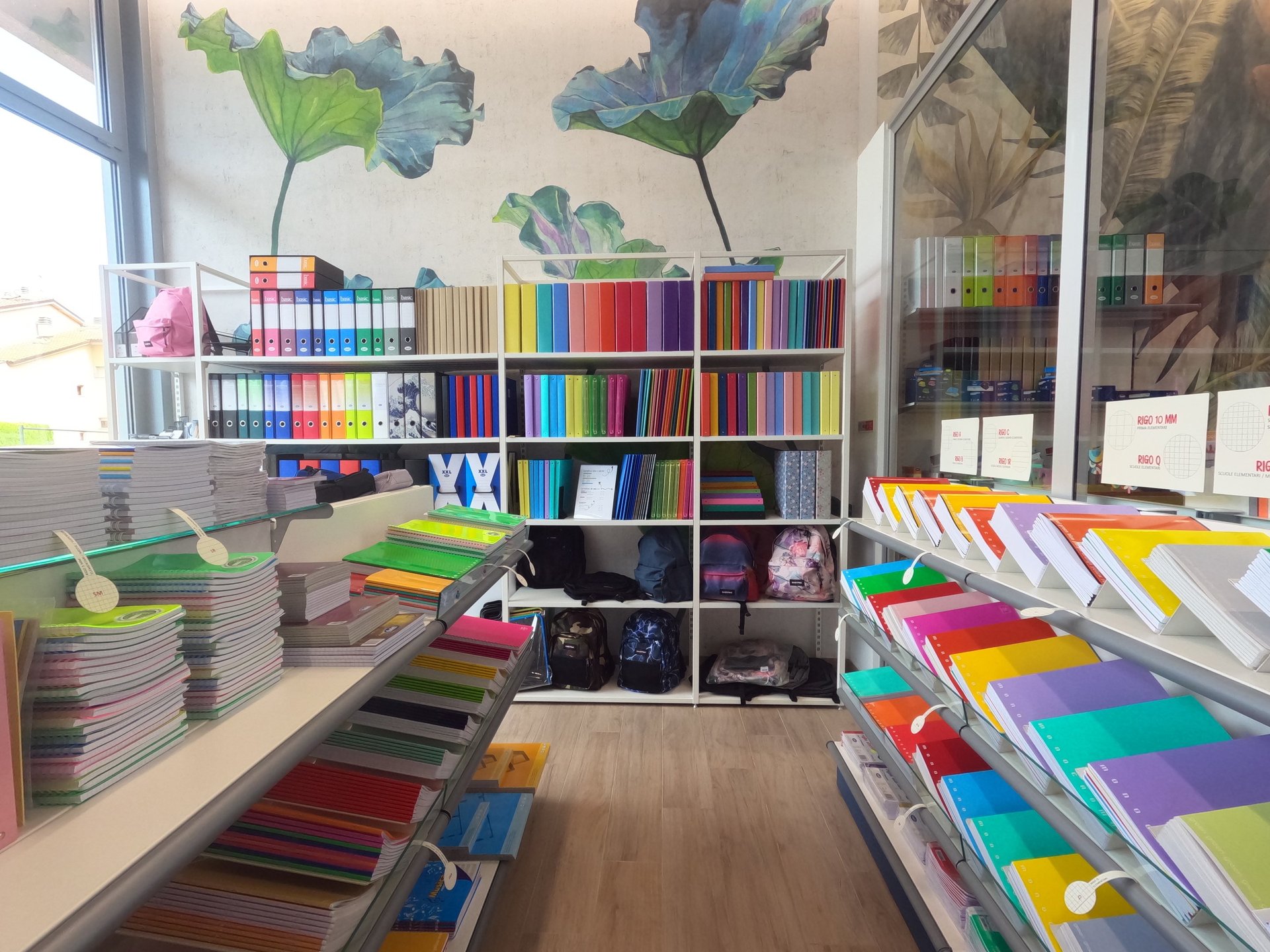 a shelf filled with lots of different colored toothbrushes