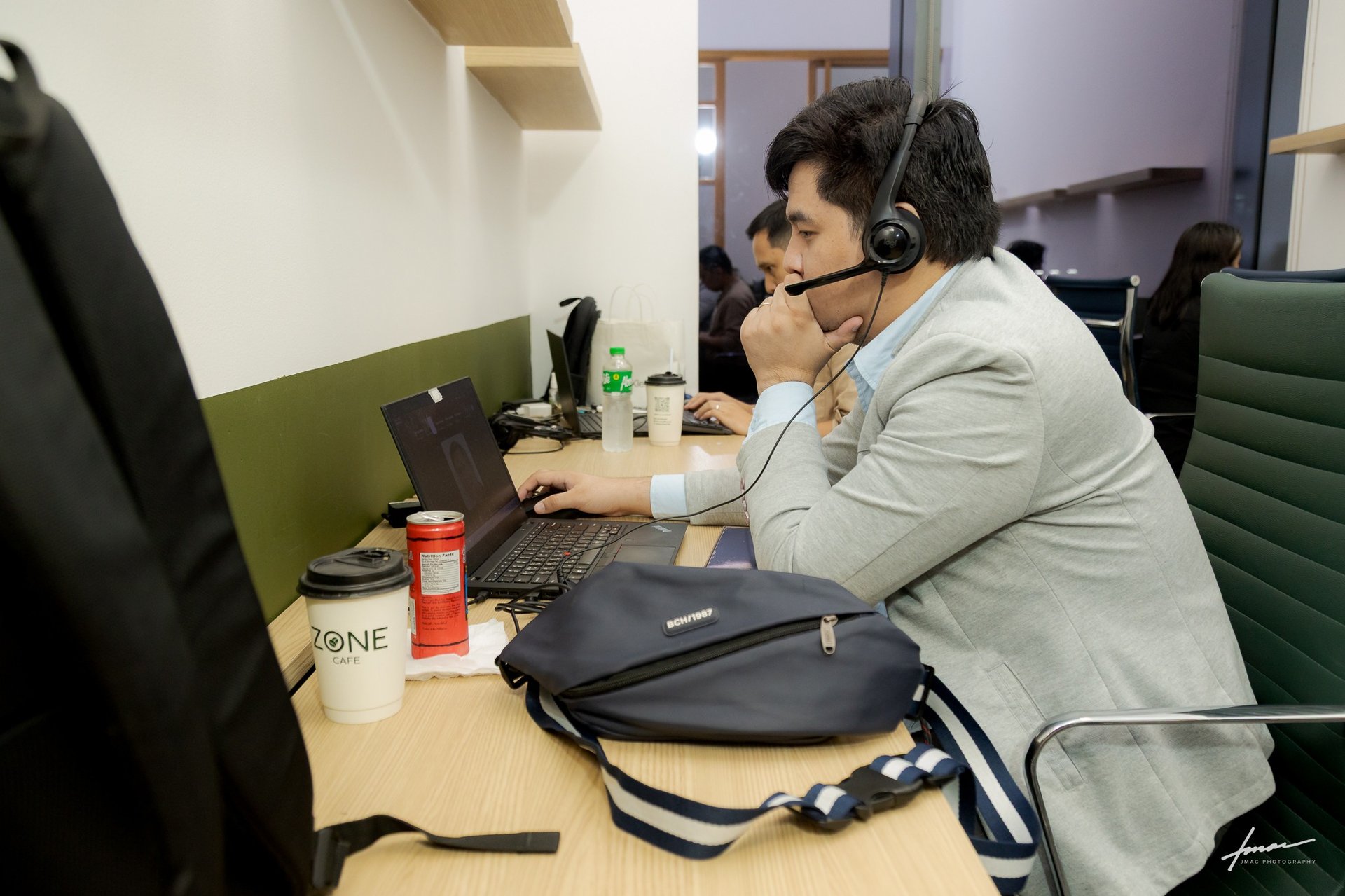 man in blue dress shirt beside man in white dress shirt