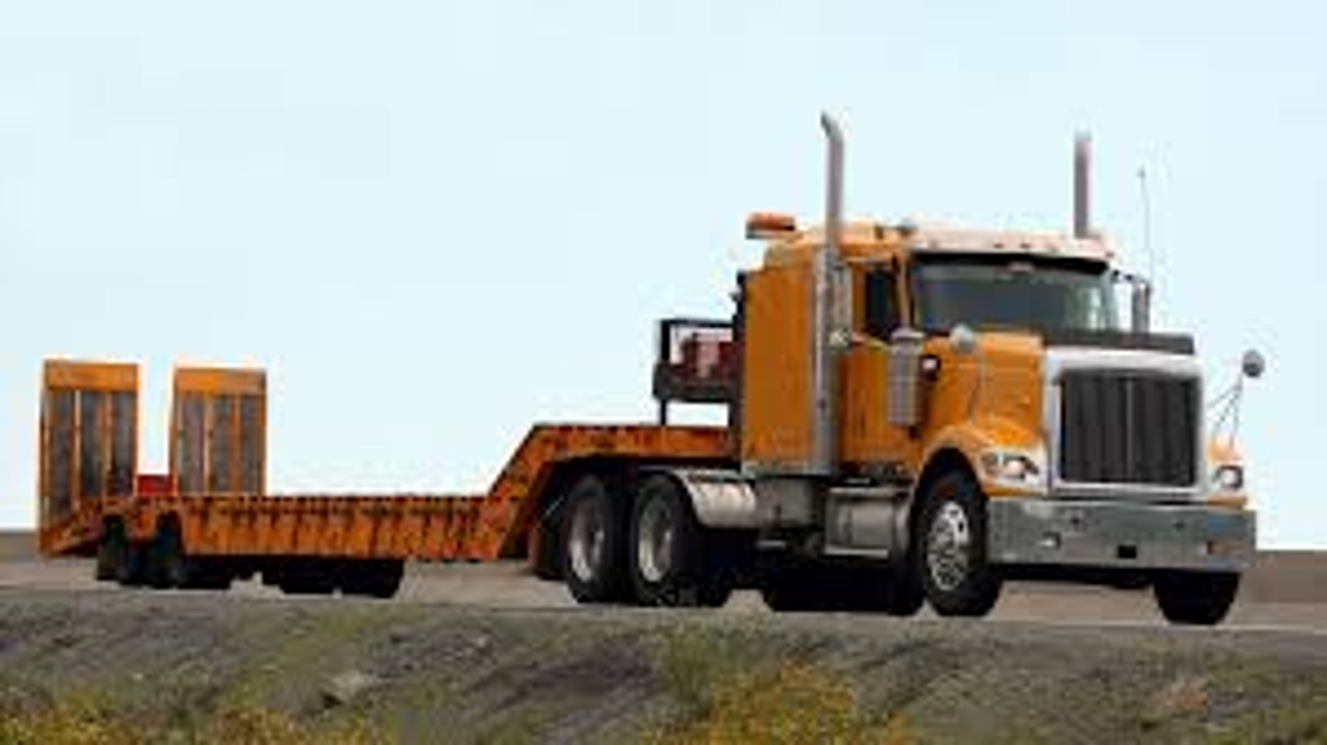 white freight truck on road during daytime