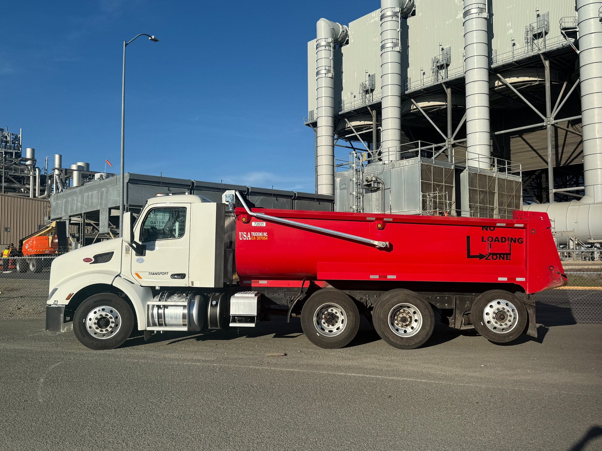 white freight truck on road during daytime