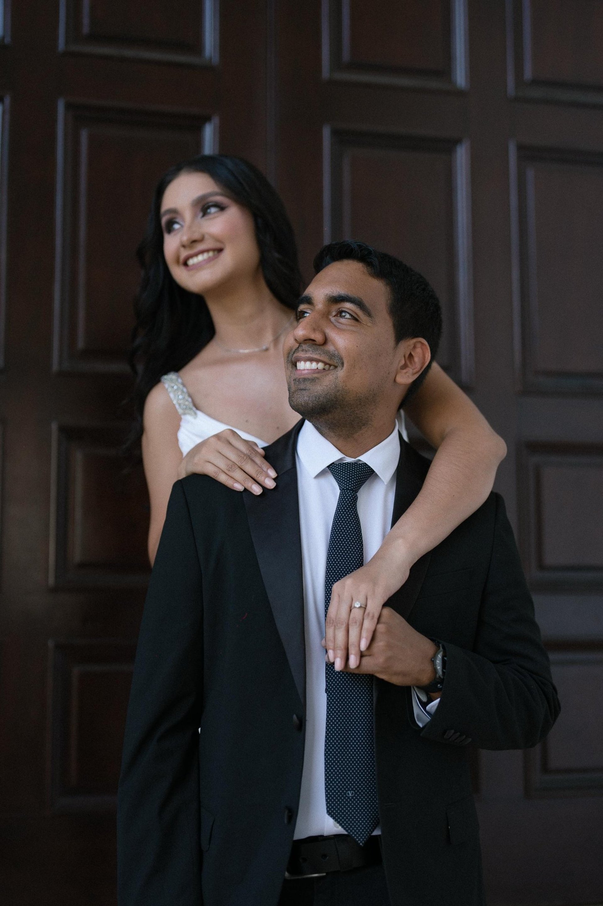 an abstract photo of a curved building with a blue sky in the background