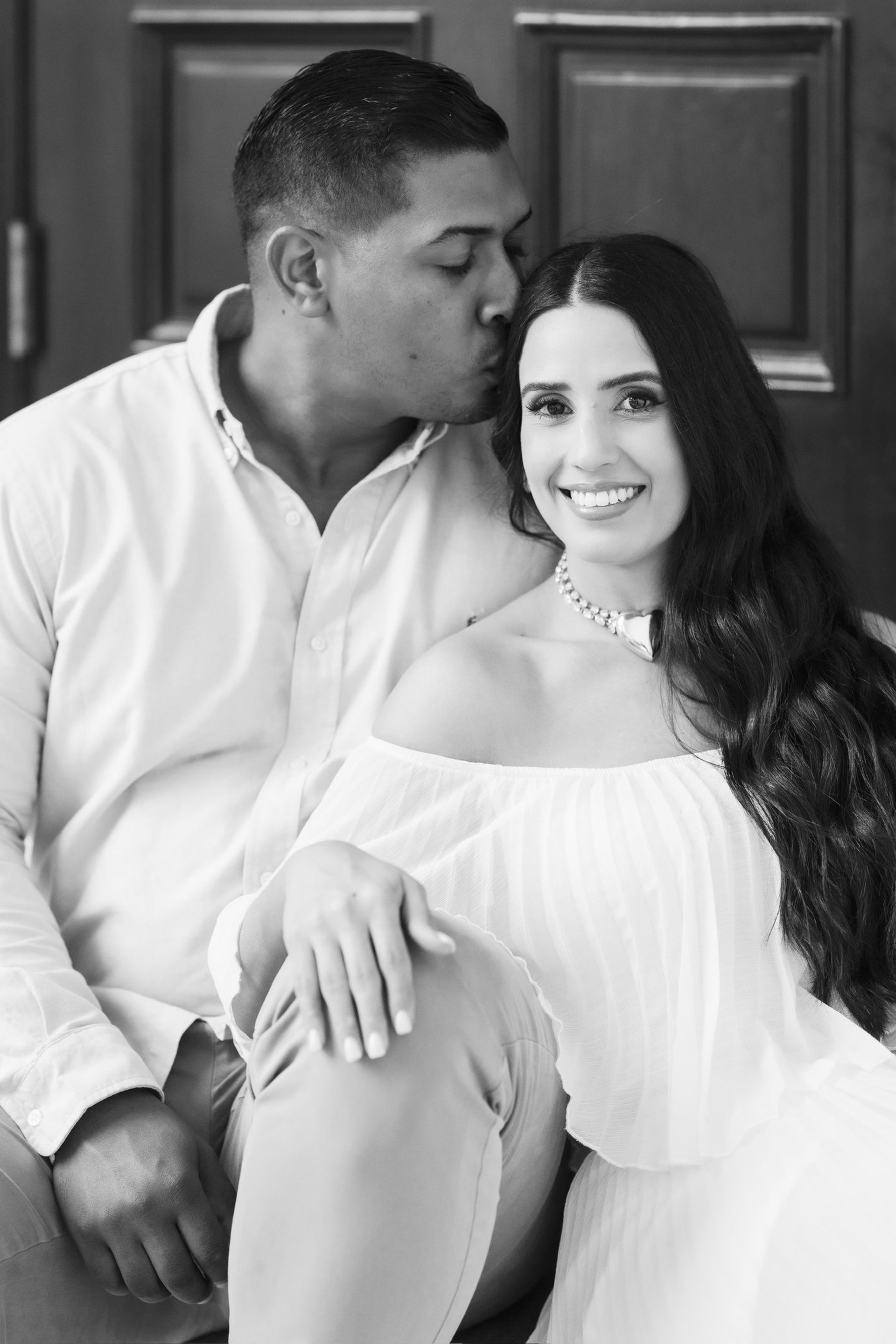 an abstract photo of a curved building with a blue sky in the background