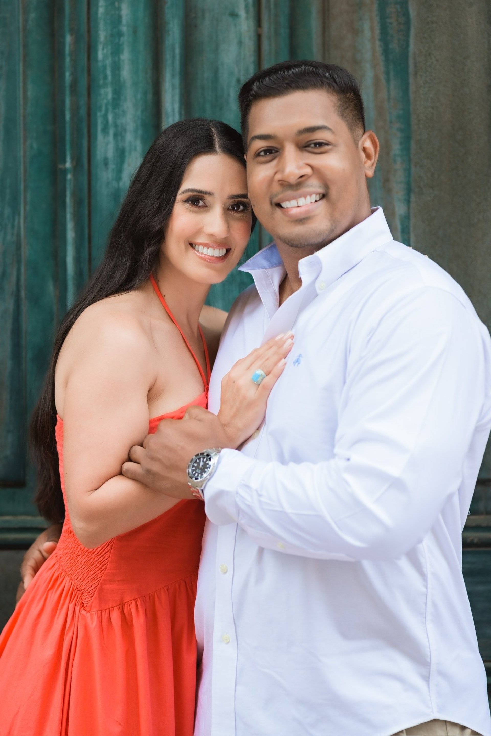 an abstract photo of a curved building with a blue sky in the background