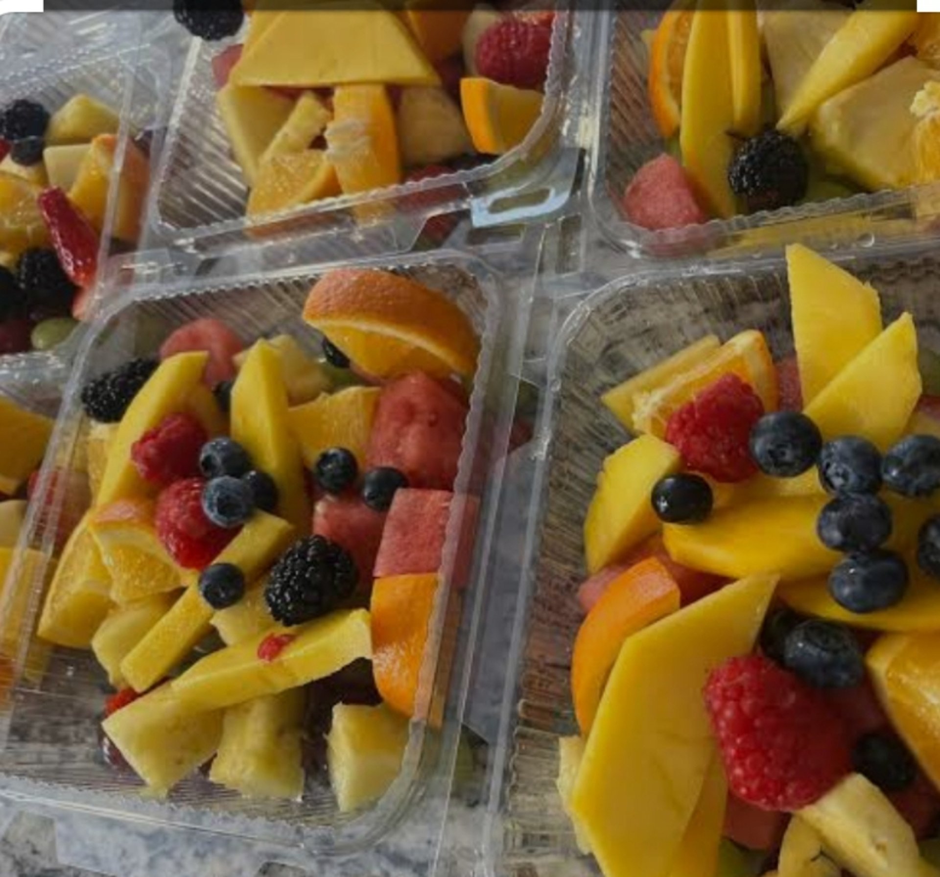 woman wearing yellow long-sleeved dress under white clouds and blue sky during daytime