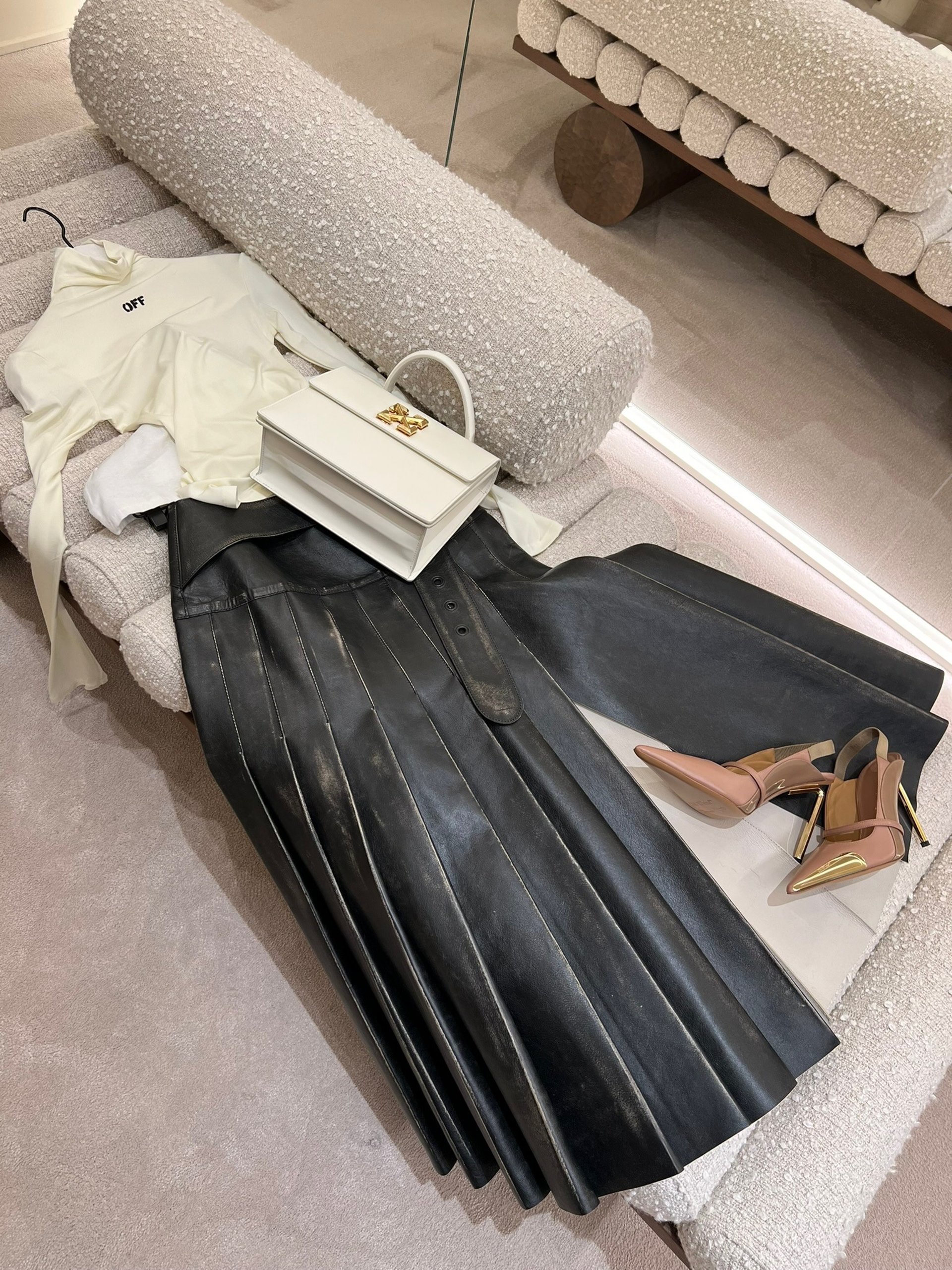 black and brown leather padded tub sofa
