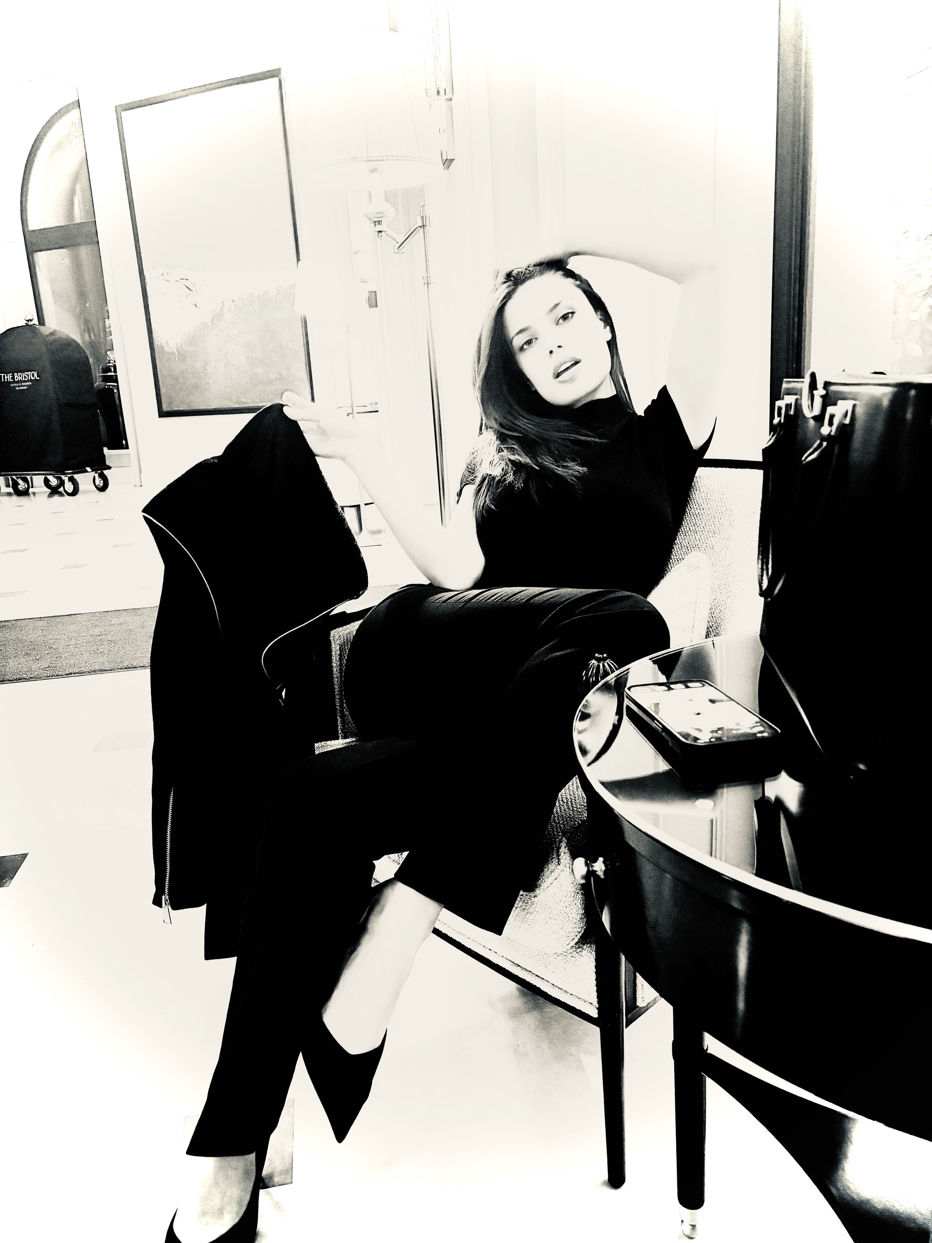 an abstract photo of a curved building with a blue sky in the background