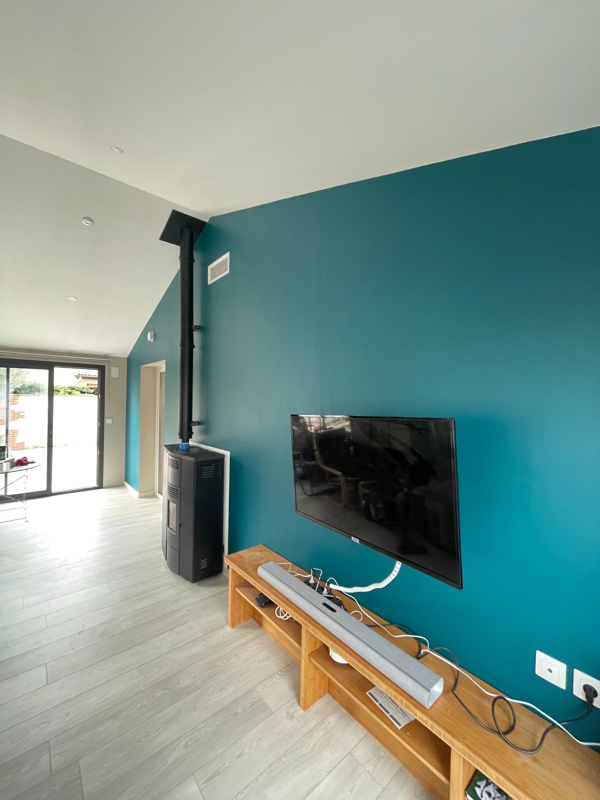 red and black cordless power drill beside black and red cordless power drill